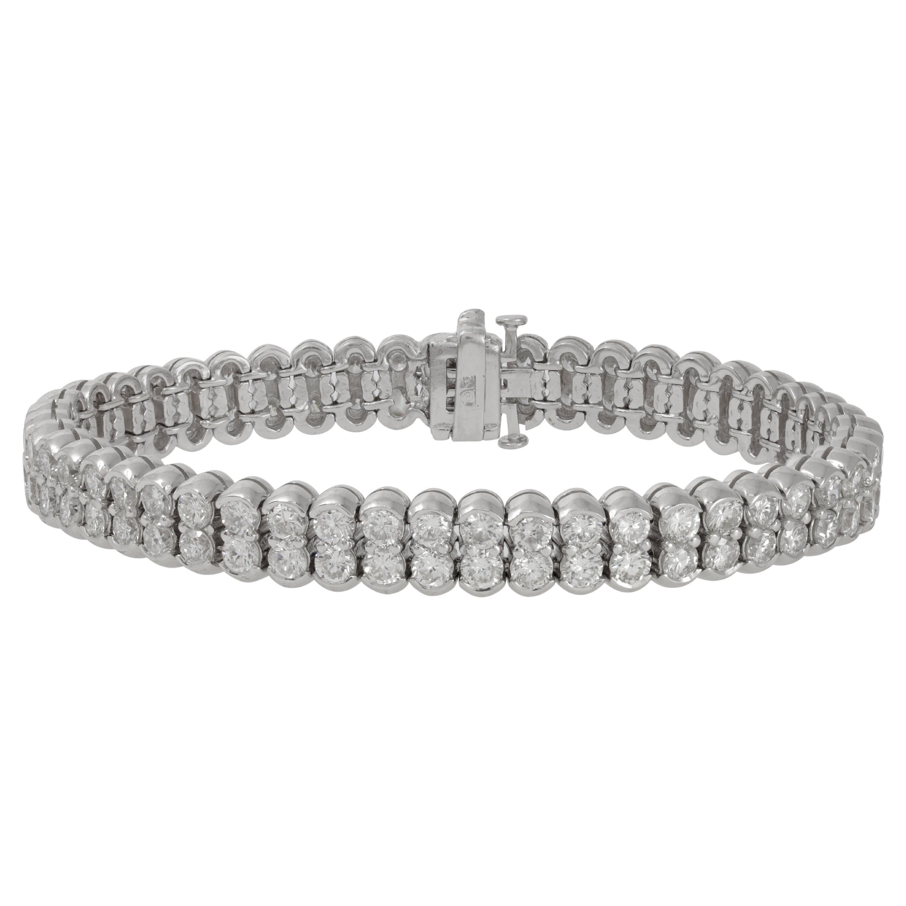 DIANA M. 18kt white gold bracelet featuring 2 rows of 11.70 cts round diamonds For Sale