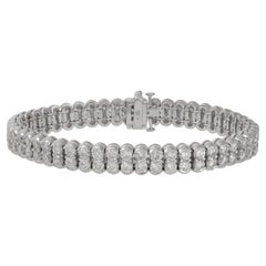 DIANA M. Bracelet en or blanc 18 carats avec 2 rangées de diamants ronds de 11,70 carats