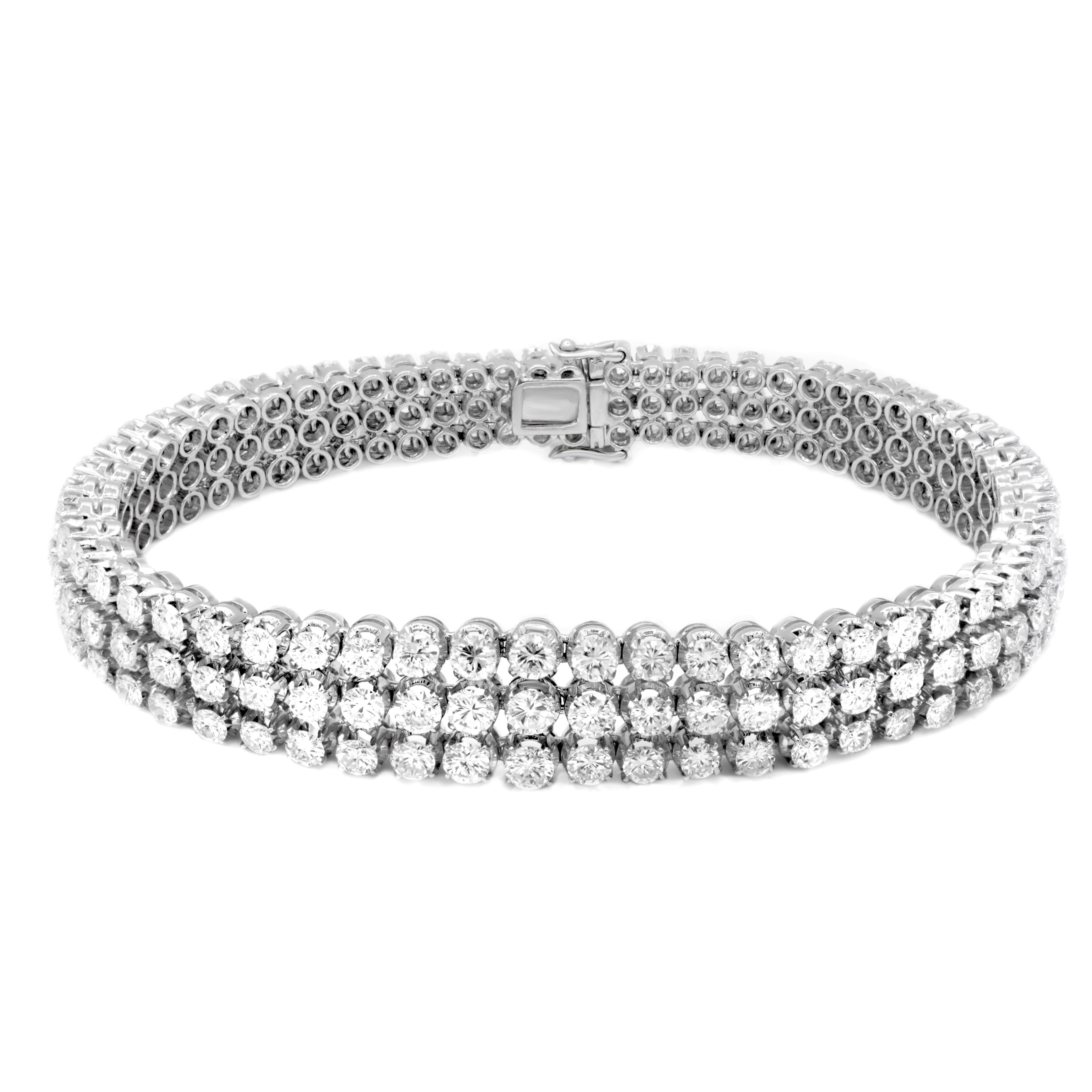18kt white gold bracelet featuring 3 rows of 9.00 cts tw of round diamonds (H-I VS)
Diana M is one-stop shop for all your jewelry shopping, carrying line of diamond rings, earrings, bracelets, necklaces, and other fine jewelry.
We create our jewelry