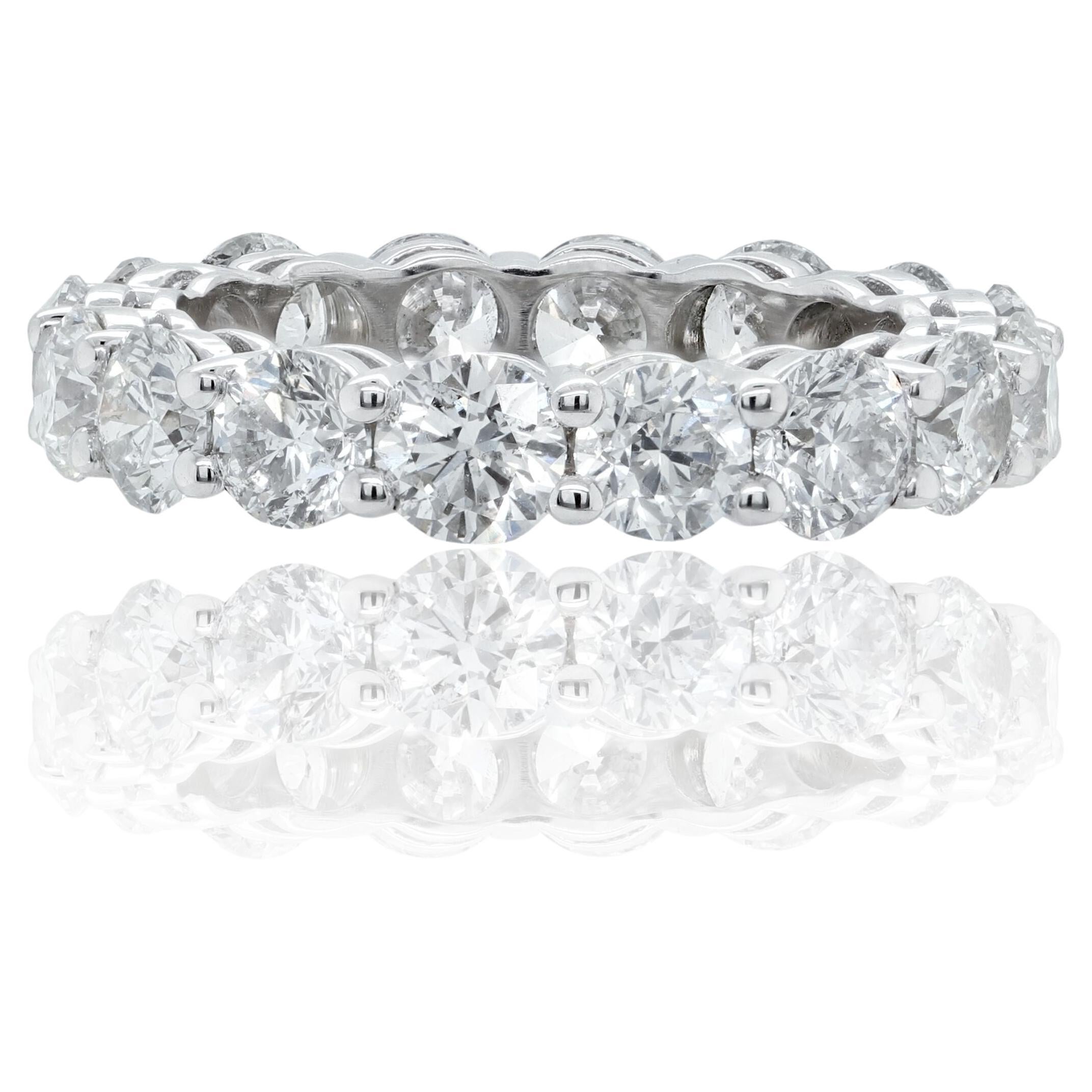 Diana M. 18KT WHITE GOLD ETERNITY BAND, 6.61CTS DIAMONDS (TCW)