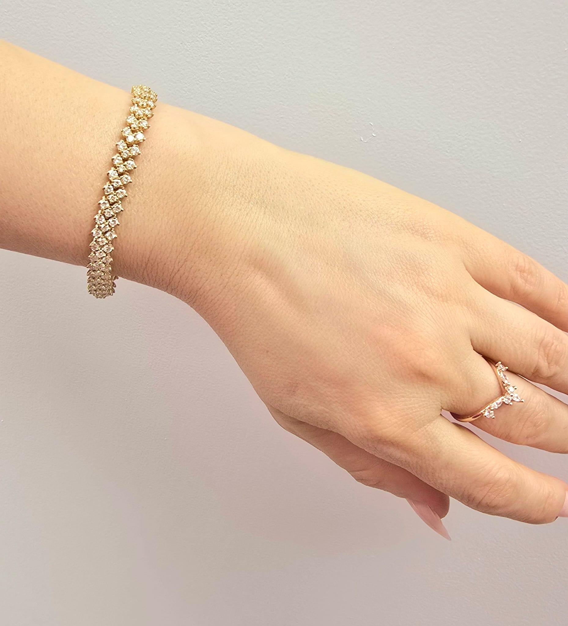 Modern Diana M. 18kt white gold fashion bracelet featuring 3 rows of 9.00 cts diamonds For Sale