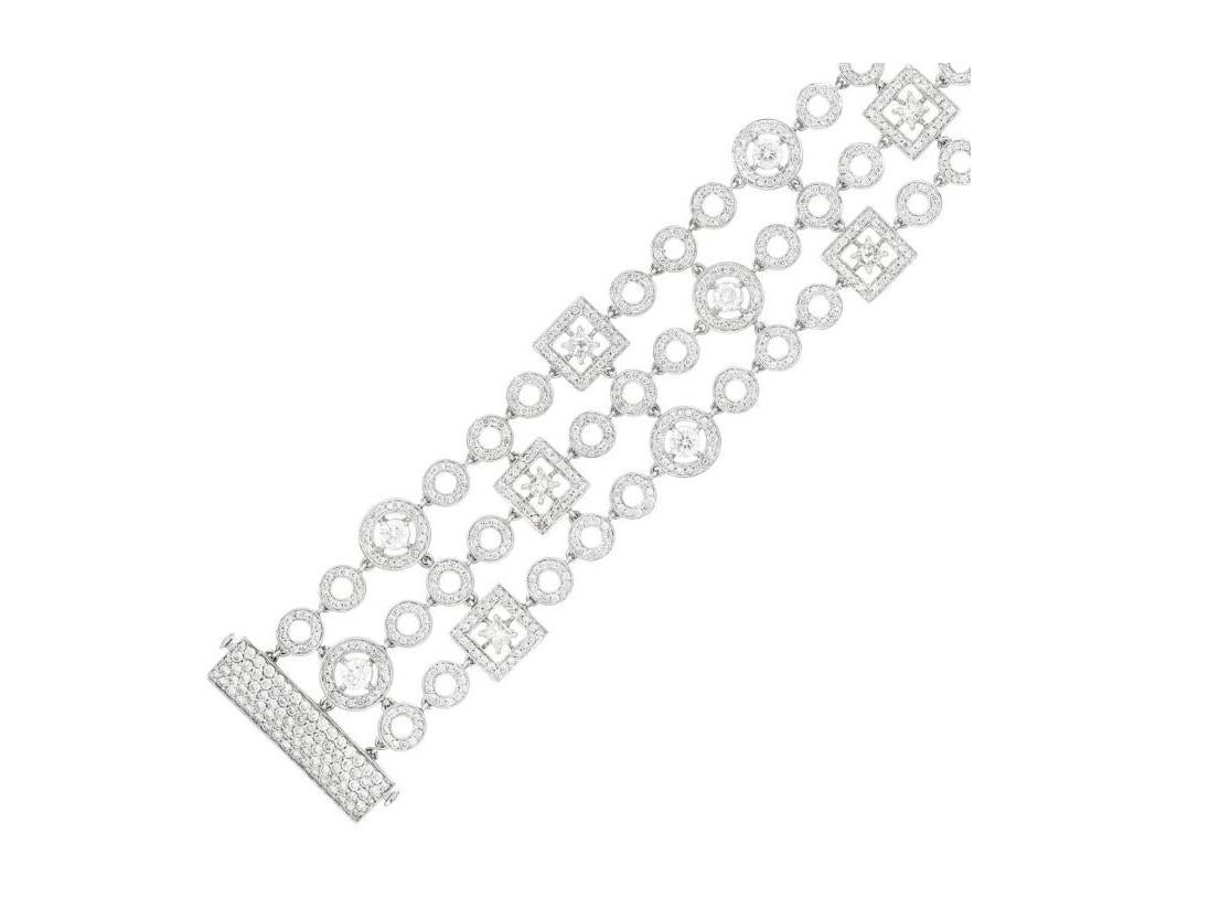 Modern Diana M. 18kt white gold fashion bracelet featuring 3 rows of 9.05 cts diamonds For Sale