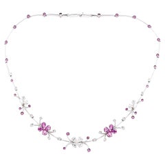 Diana M. Collier fleur et papillon en or blanc 18 carats avec 3,50 carats