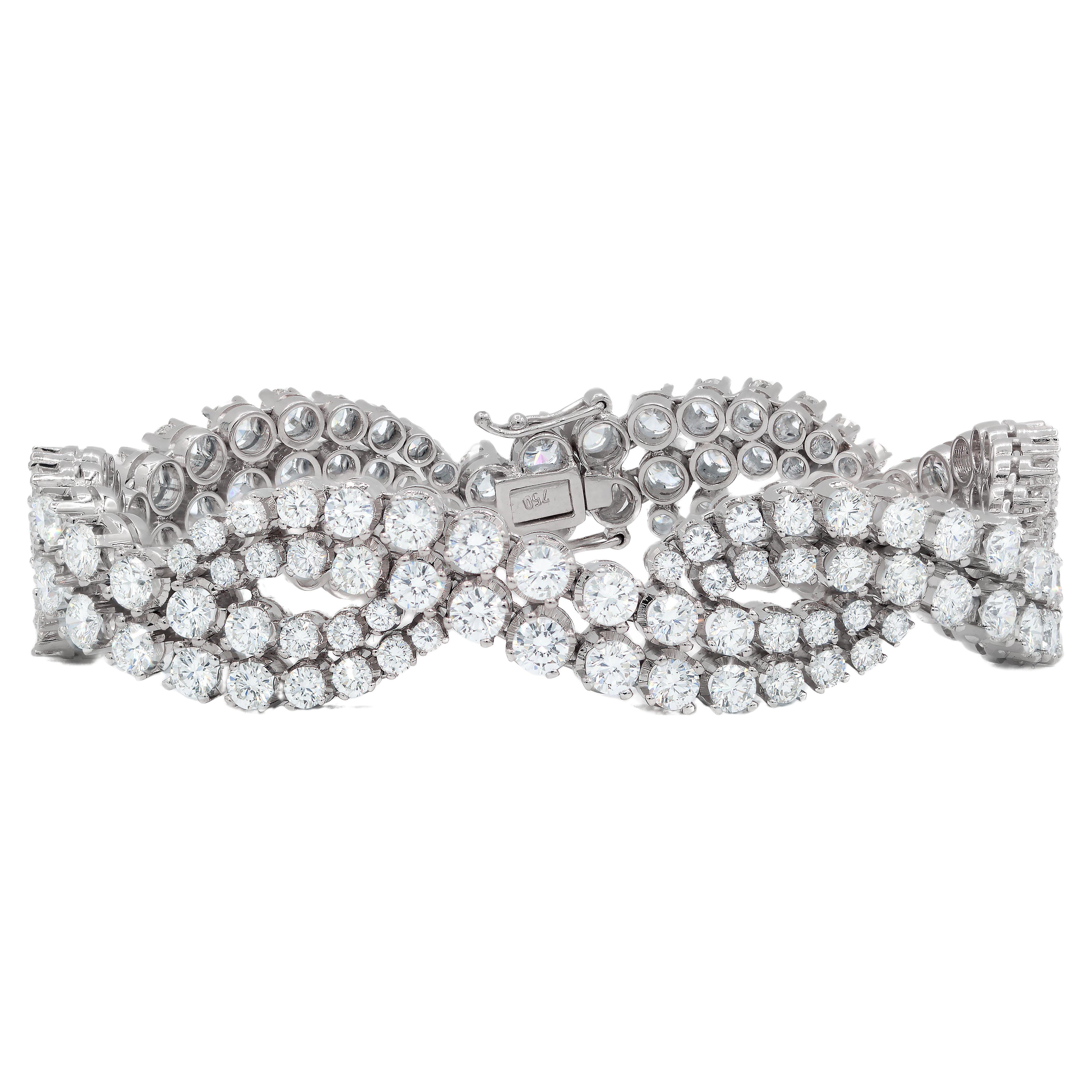 Diana M. 18kt white gold infinity bracelet featuring 18.06 cts tw of  diamonds  For Sale