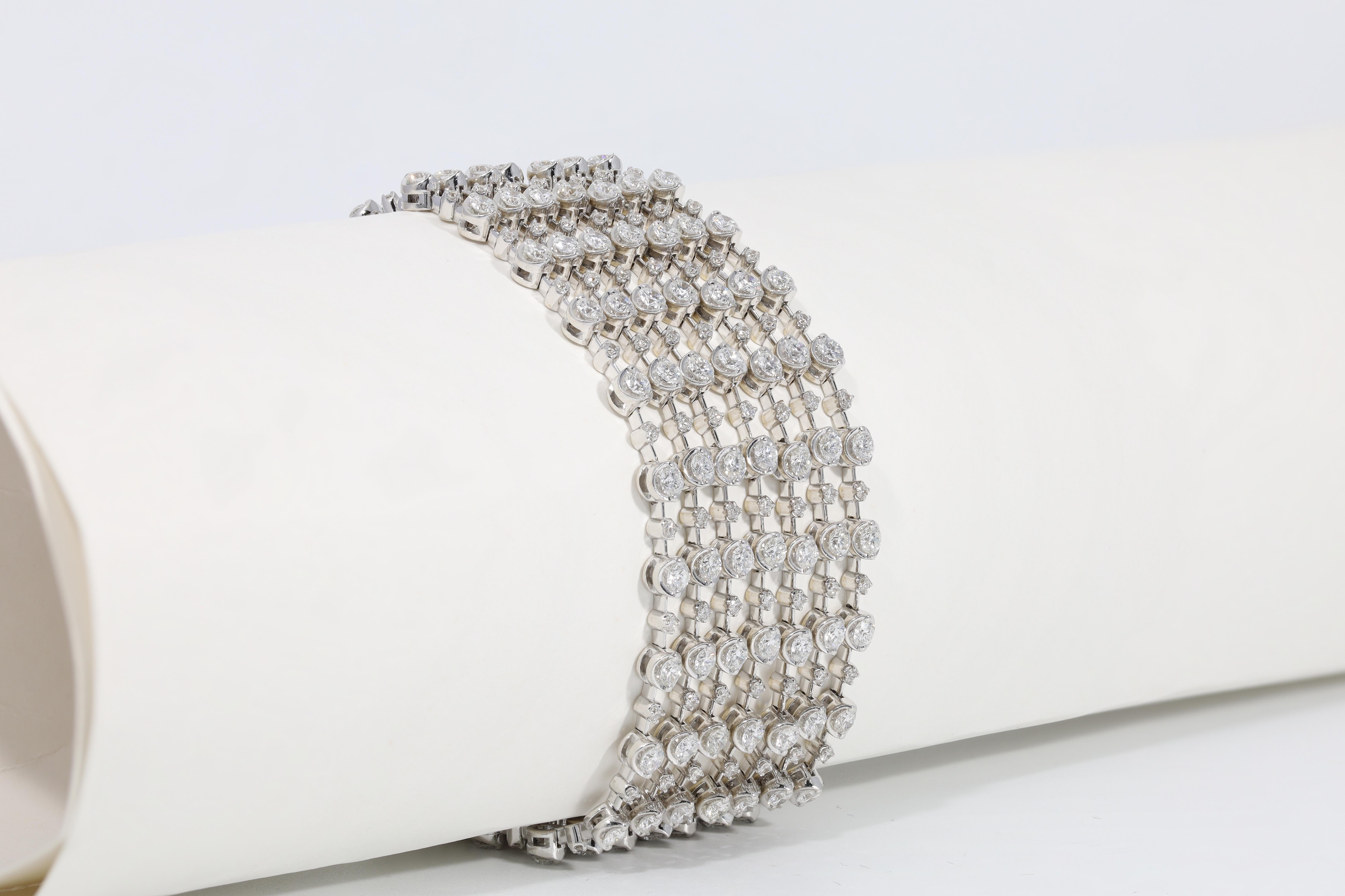 Round Cut Diana M. 18kt white gold seven row bracelet featuring 13.00 cts of round diamond For Sale