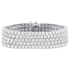 Diana M. 18kt white gold tennis bracelet featuring 5 rows of 36.00 cts round dia