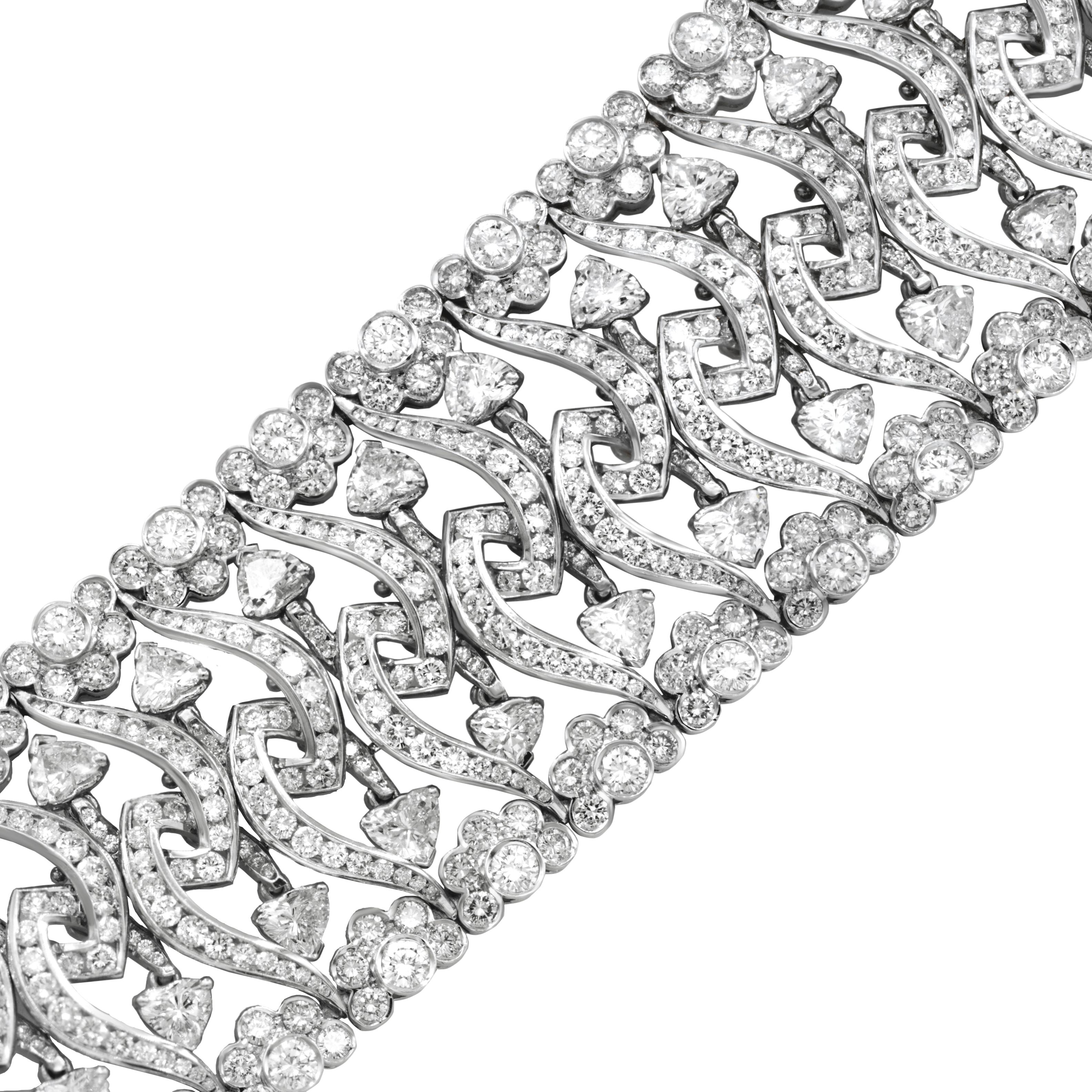 18kt white gold wide, flexible fashion heart bracelet featuring 32.50 carats of diamonds
