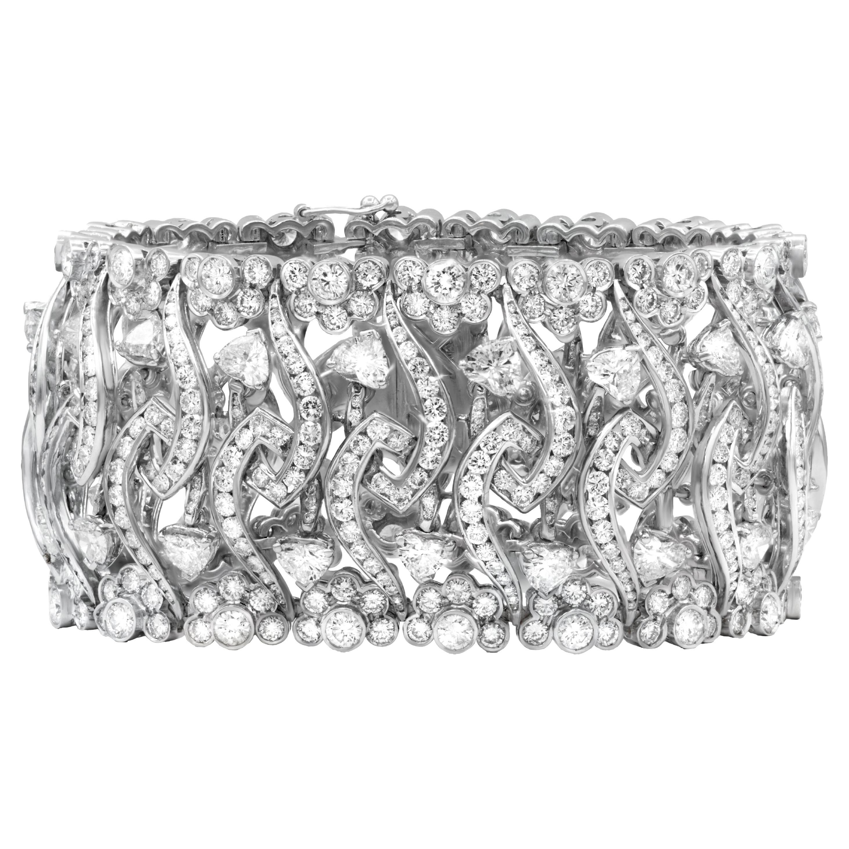 Diana M. 18kt white gold wide, flexible fashion heart bracelet featuring 32.50ct For Sale