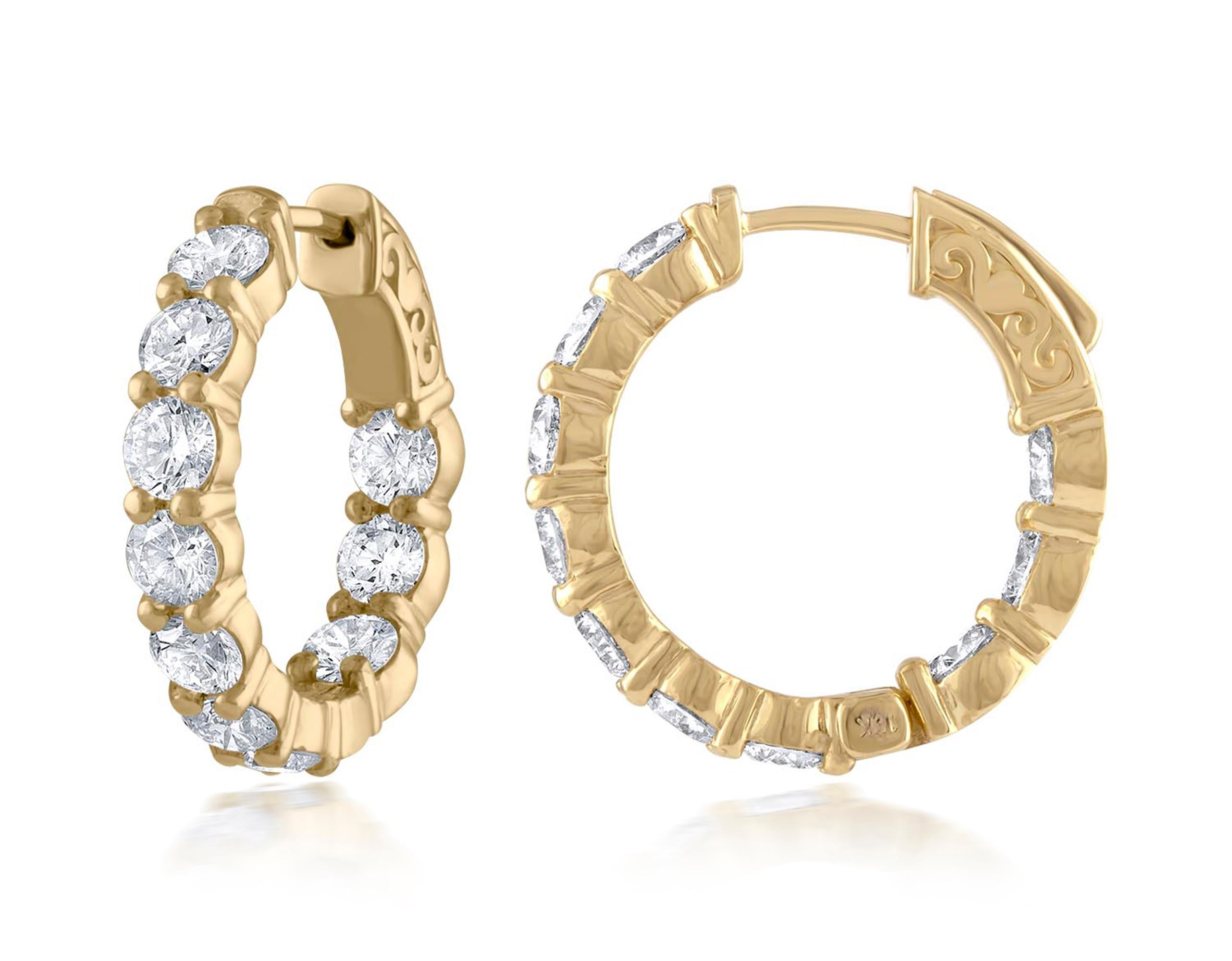   Diana M. 18kt yellow gold diamond hoops containing 4.30 cts tw of round diamonds (20 stones) measuring 0.75