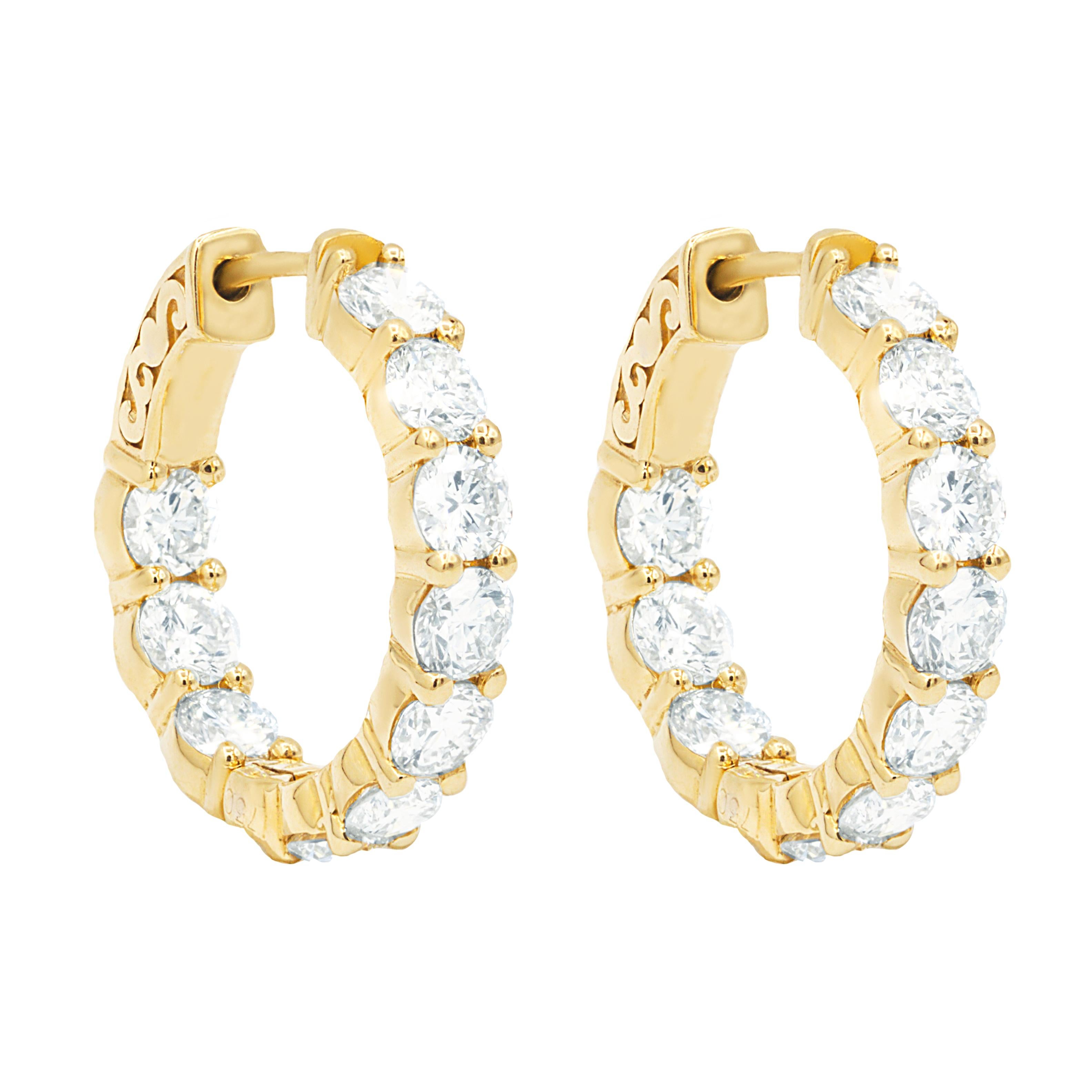 Modern Diana M. 18kt yellow gold diamond hoops containing 4.30 cts tw of round diamonds For Sale