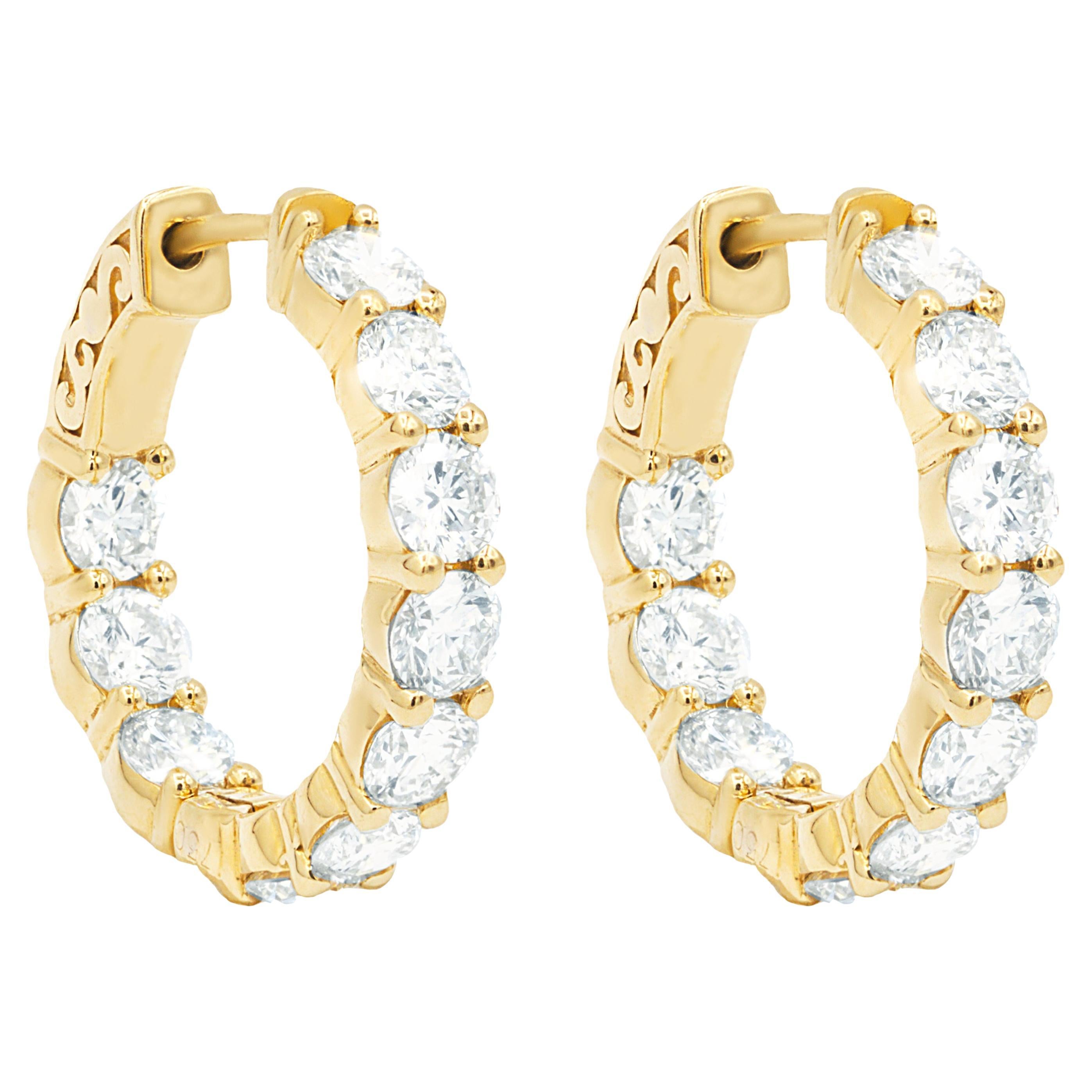 Diana M. 18kt yellow gold diamond hoops containing 4.30 cts tw of round diamonds For Sale