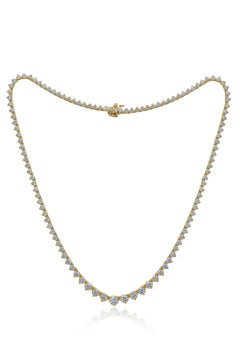 Diana M. Collier tennis Reviera gradué en or jaune 18 carats comprenant 11,15 carats