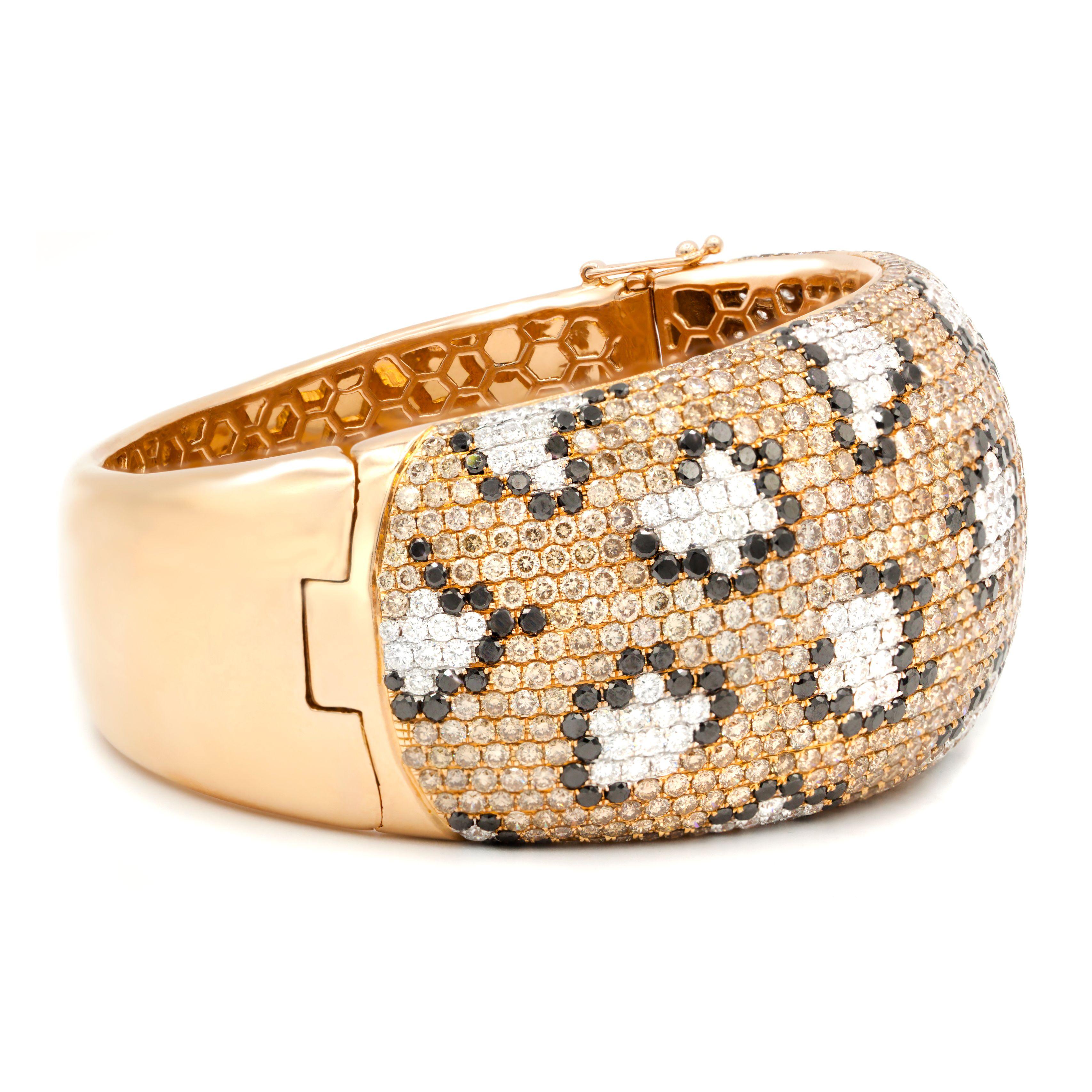 18 kt rose gold diamond bangle adorned with yellow diamonds and black and white spots totaling 23.55 cts tw of diamonds