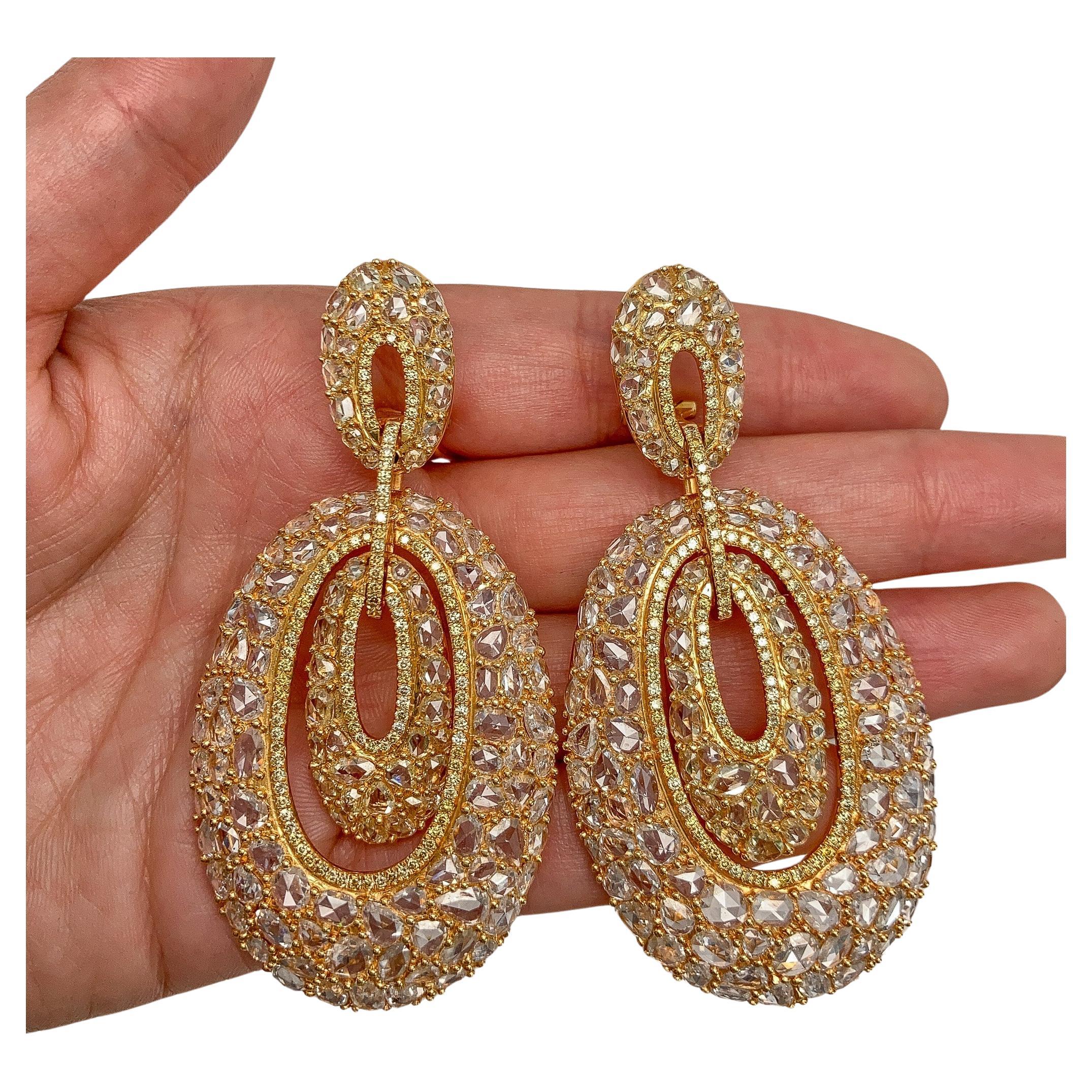 These vintage-inspired chandelier earrings feature 24.00 carats of rose-cut diamonds, set in 18-karat gold. They exude timeless elegance and charm with a length of 1.4 inches.