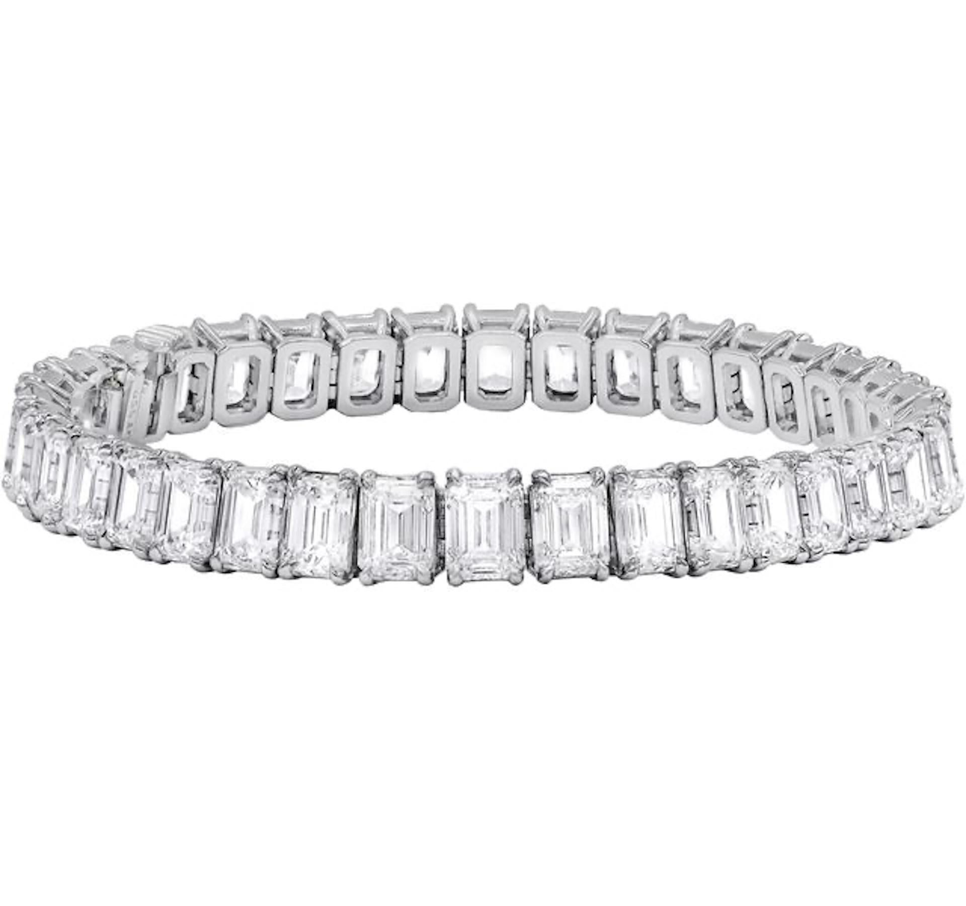 Platinum custom gold 4 prong diamond bracelet 26.97 cts 0.73 each GIA certified emerald cut diamonds DEF color, VVS-VS clarity, 37 stones.Excellent cut.