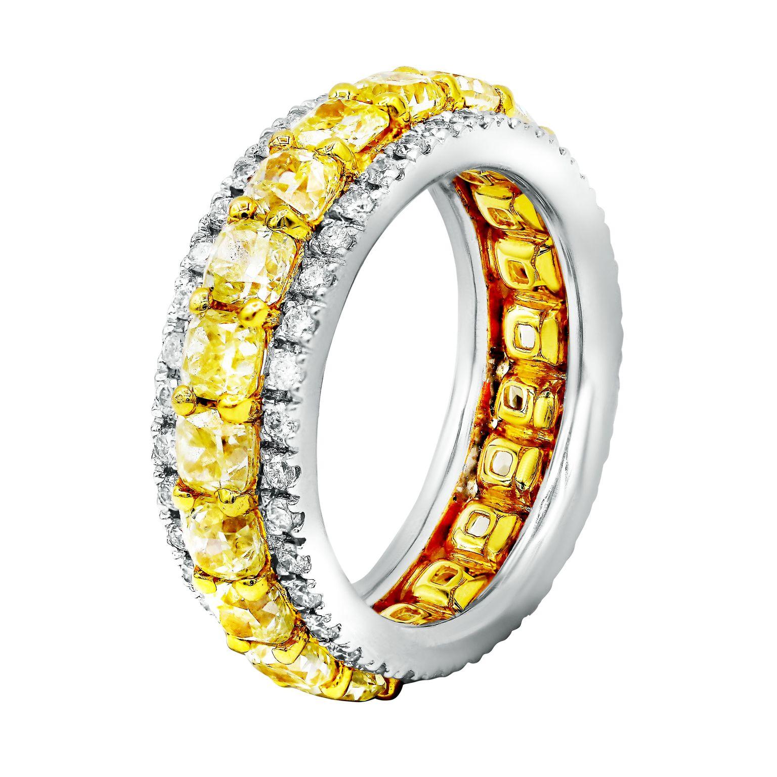 18kt yellow and white gold diamond band featuring 4.26 cts of yellow diamonds and 0.72 cts of white diamonds 