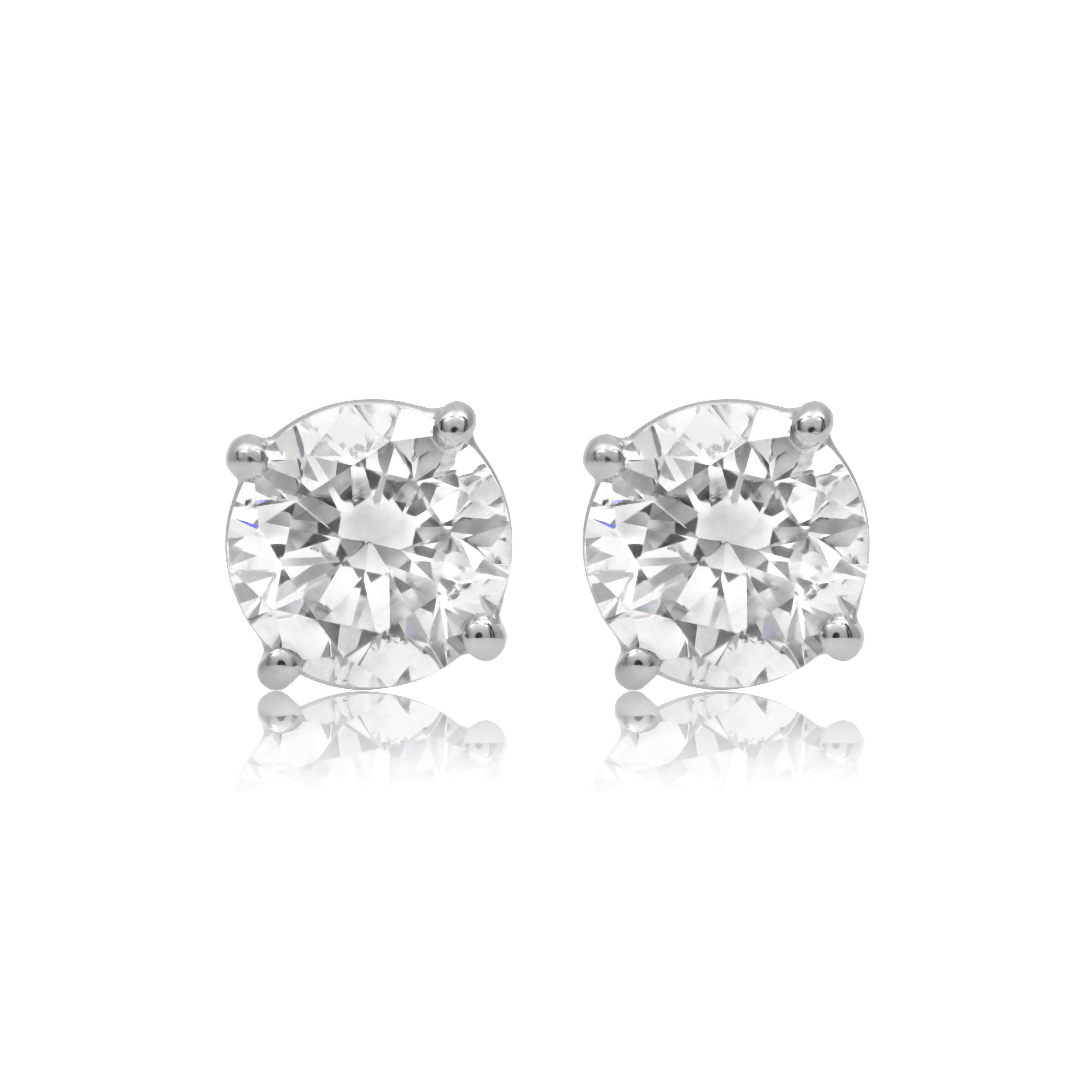 Diana M. 4.55cts  4 prong Diamond studs HI Color SI Clarity screw Backs   In New Condition For Sale In New York, NY