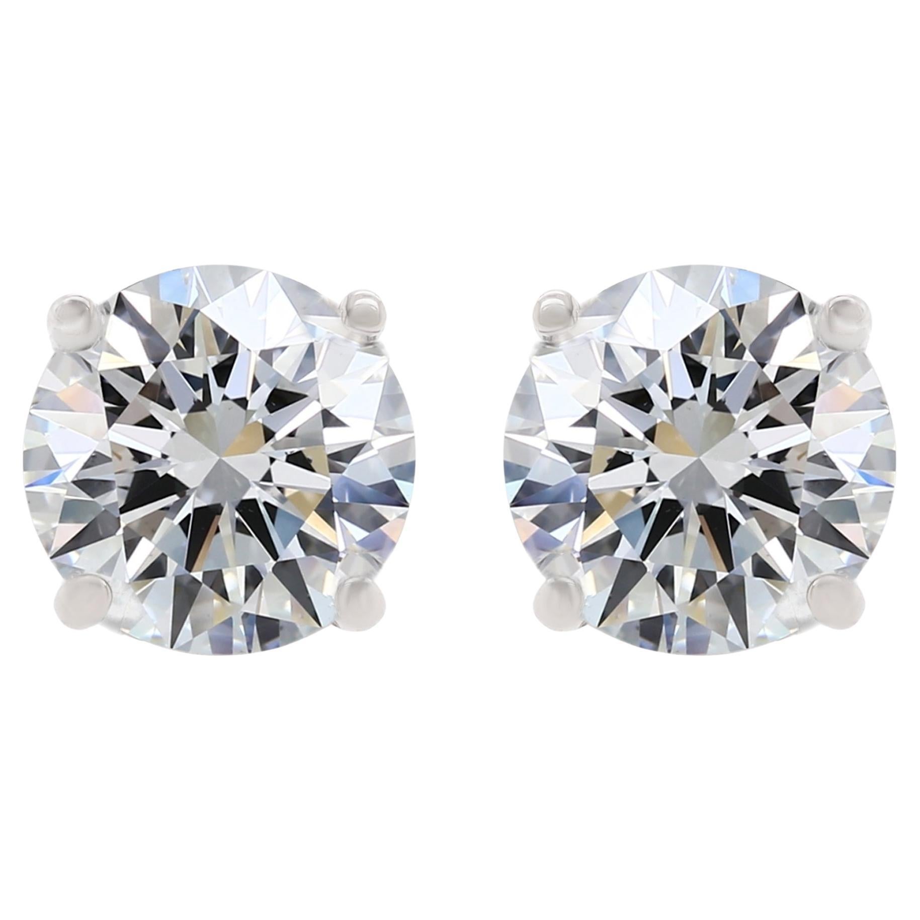 Diana M. 4.55cts  4 prong Diamond studs HI Color SI Clarity screw Backs   For Sale