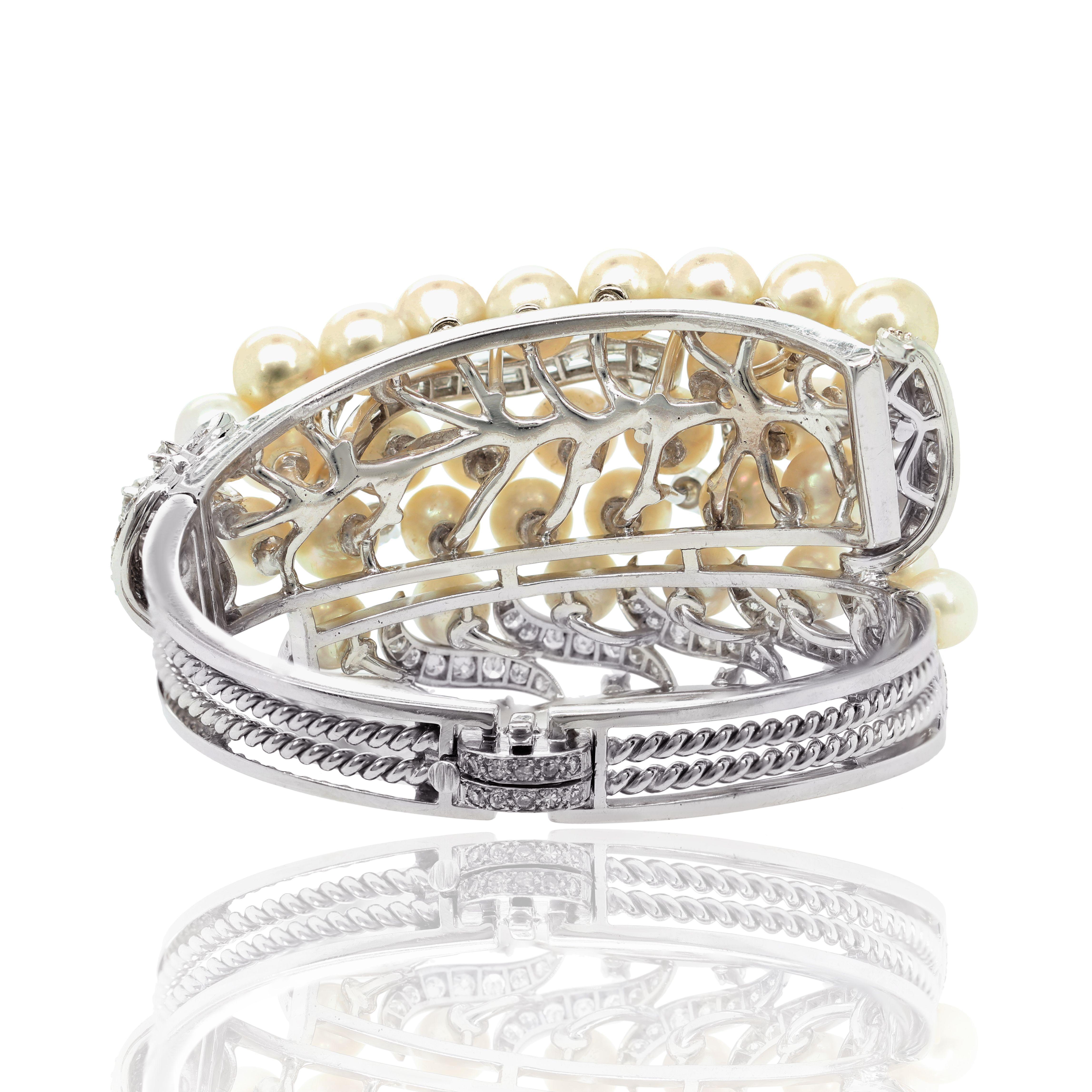 18 kt white gold antique bangle adorned with 5.00-7.50 mm pearls and 5.00 cts tw round diamonds
