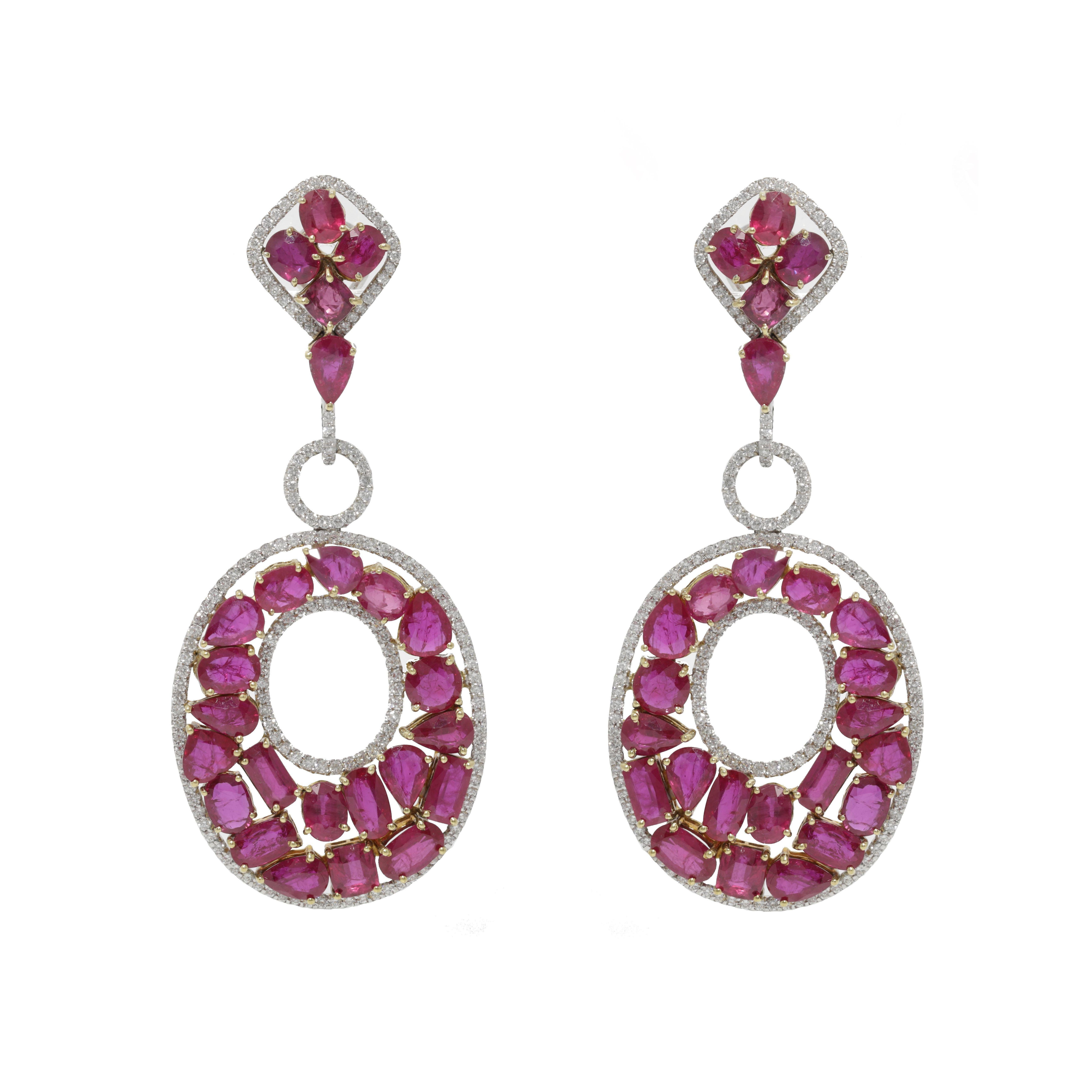 Ruby and diamond chandelier earrings with 53.20ct of rubies and 7.65ct of diamonds set in 18kt white and yellow gold.