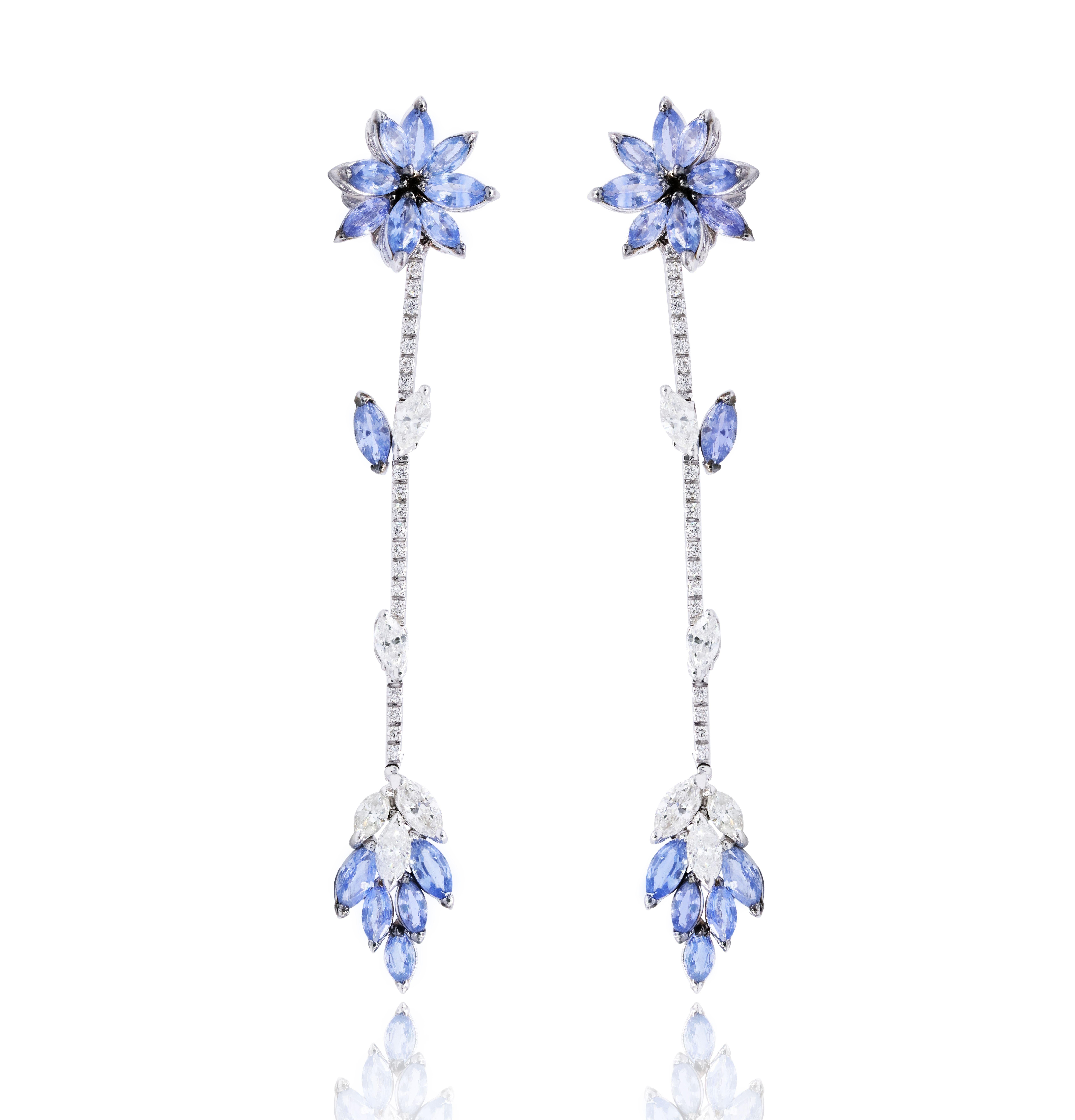 18kt white gold hanging flower sapphires and diamonds, features 6.23 carats of marquise sapphires with 2.05 carats of round and marquise diamonds.