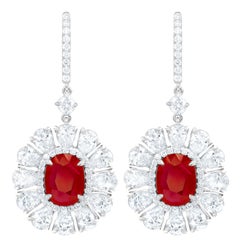 Diana M. 6.69 Carat Ruby Set in Diamond Halo Flower Shaped Earrings