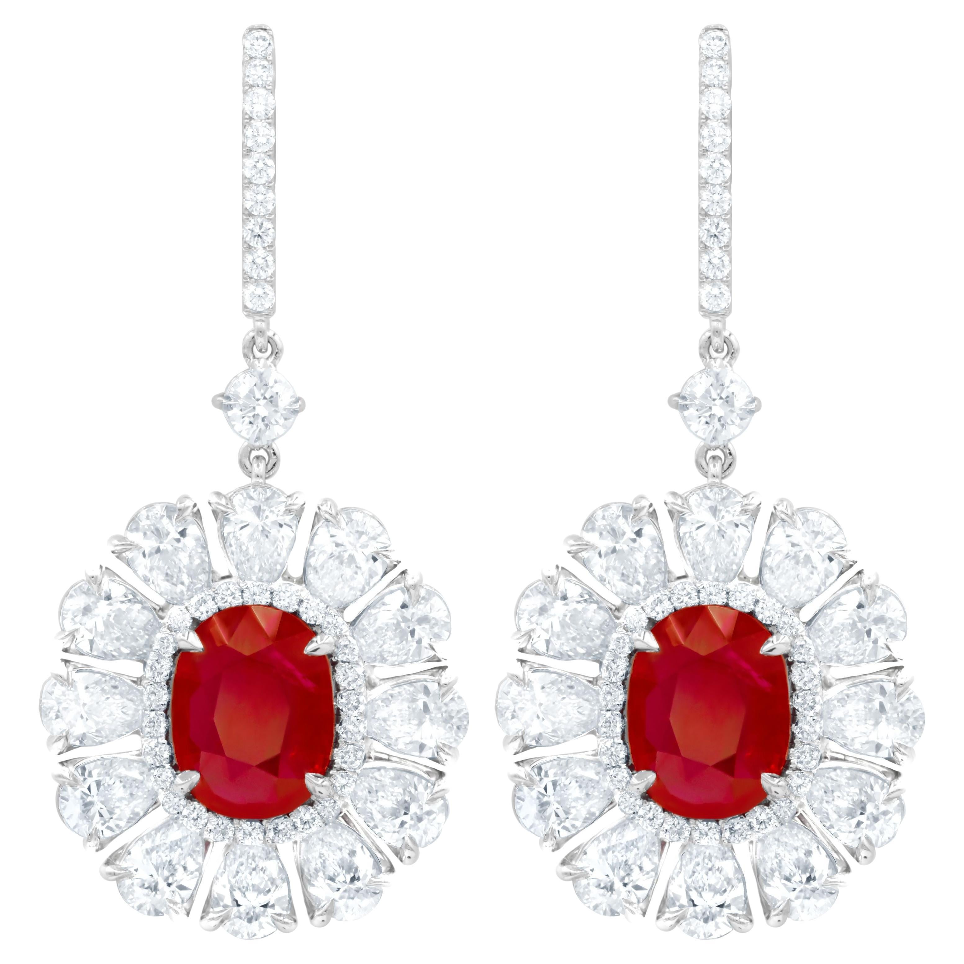 Diana M. 6.69 Carat Ruby Set in Diamond Halo Flower Shaped Earrings For Sale