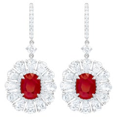 Diana M. 6.69 Carat Ruby Set in Diamond Halo Flower Shaped Earrings