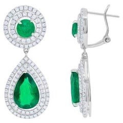 Diana M. 7.64Cts. Pear Shape and Emerals Earrings