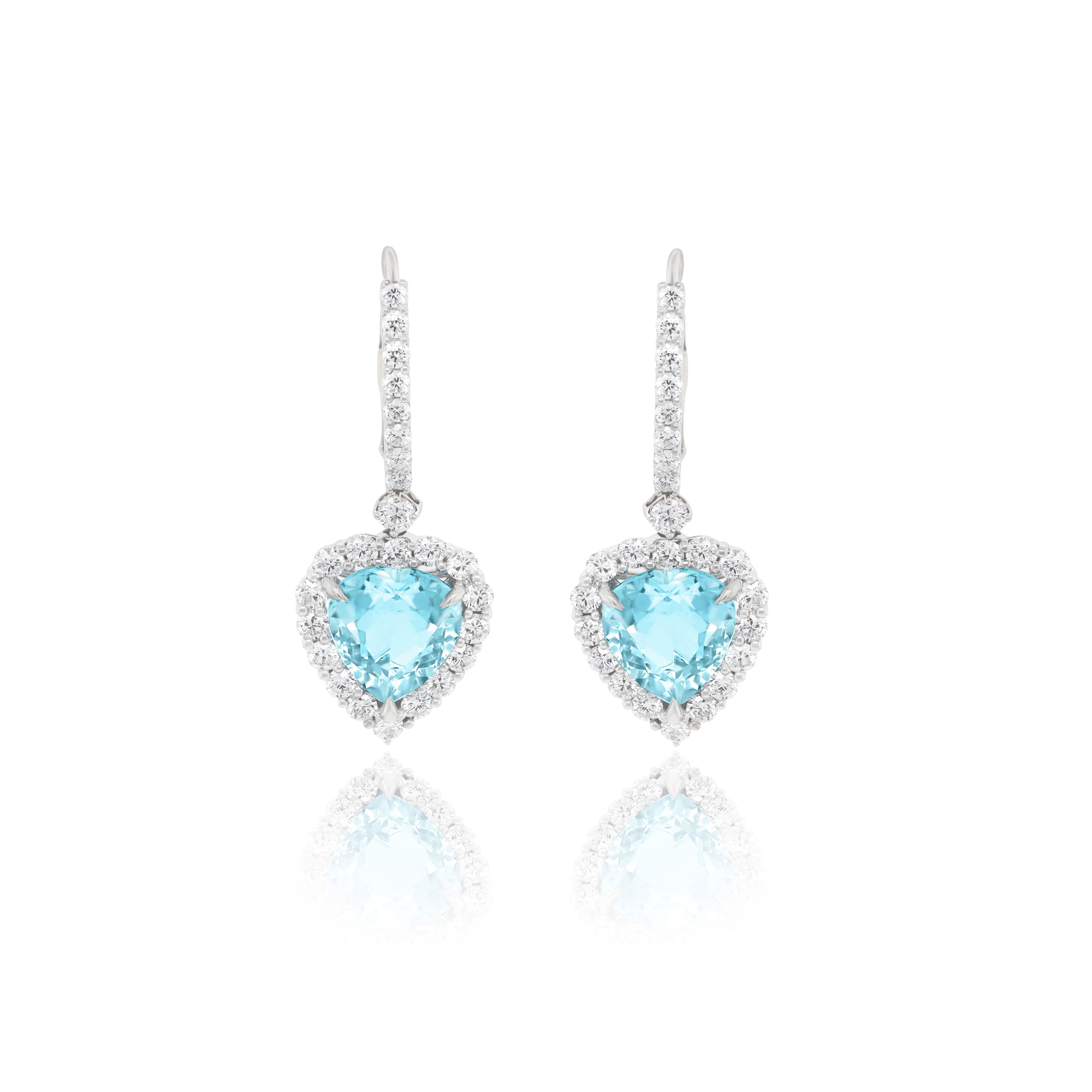18kt white gold fashion earring 2pcs aquamarine heart center stone 7.70 cts with 2pcs marquise 0.18cts and 48 stone 2.42 cts diamonds around.
