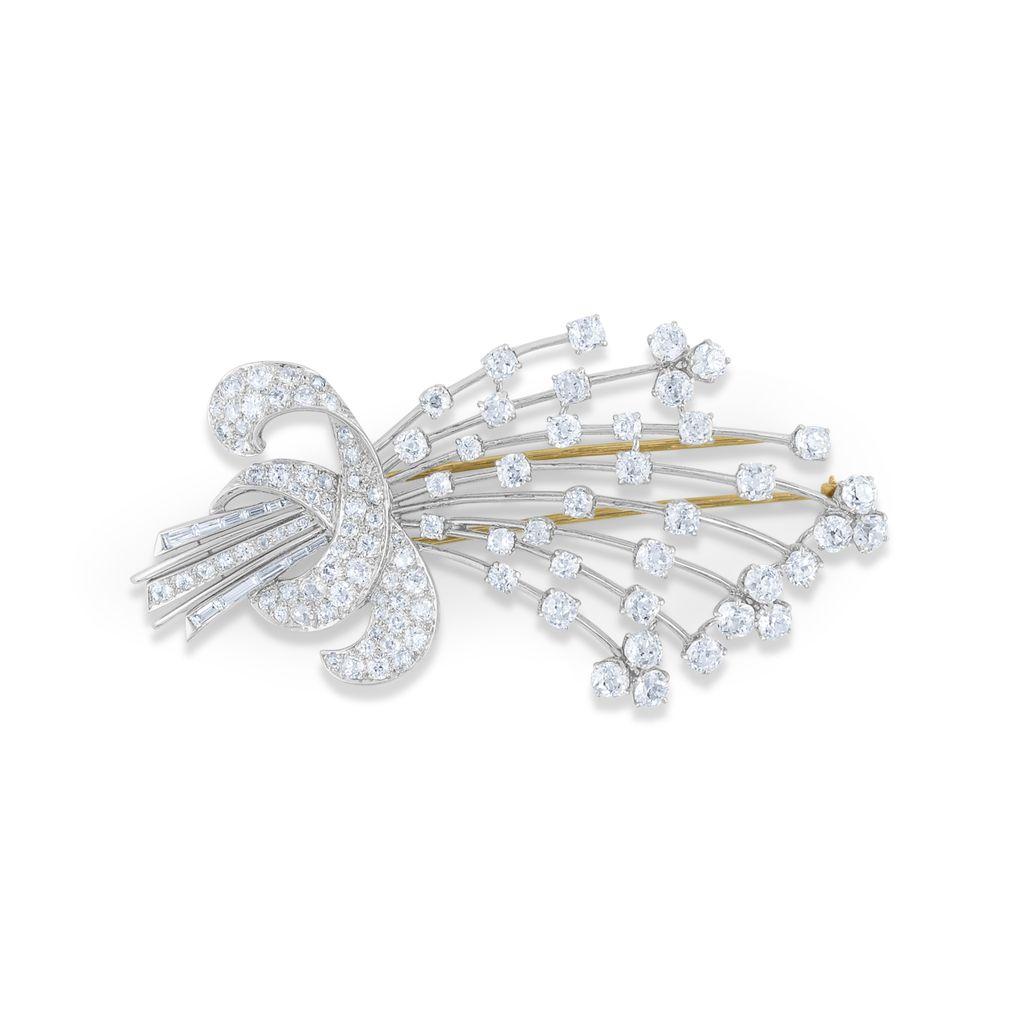 18 kt white gold art deco brooch with approximately 9.00 cts of FG VS/SI round diamonds

