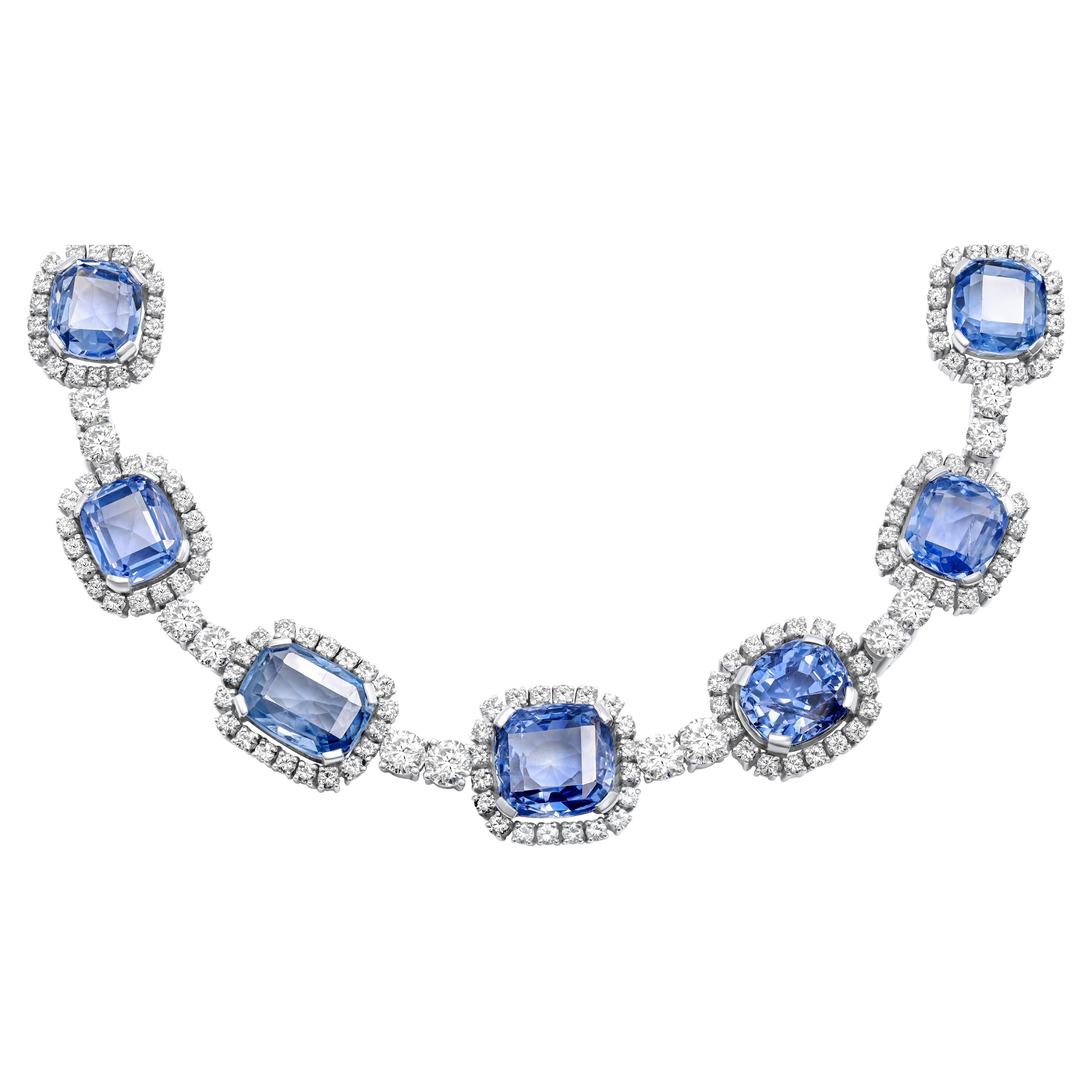 18kt diamond and sapphire necklace. This Necklace Contains 96.47 cts cushion cut no heat sapphire and 25.00 cts of diamonds around, certified global gems#032768