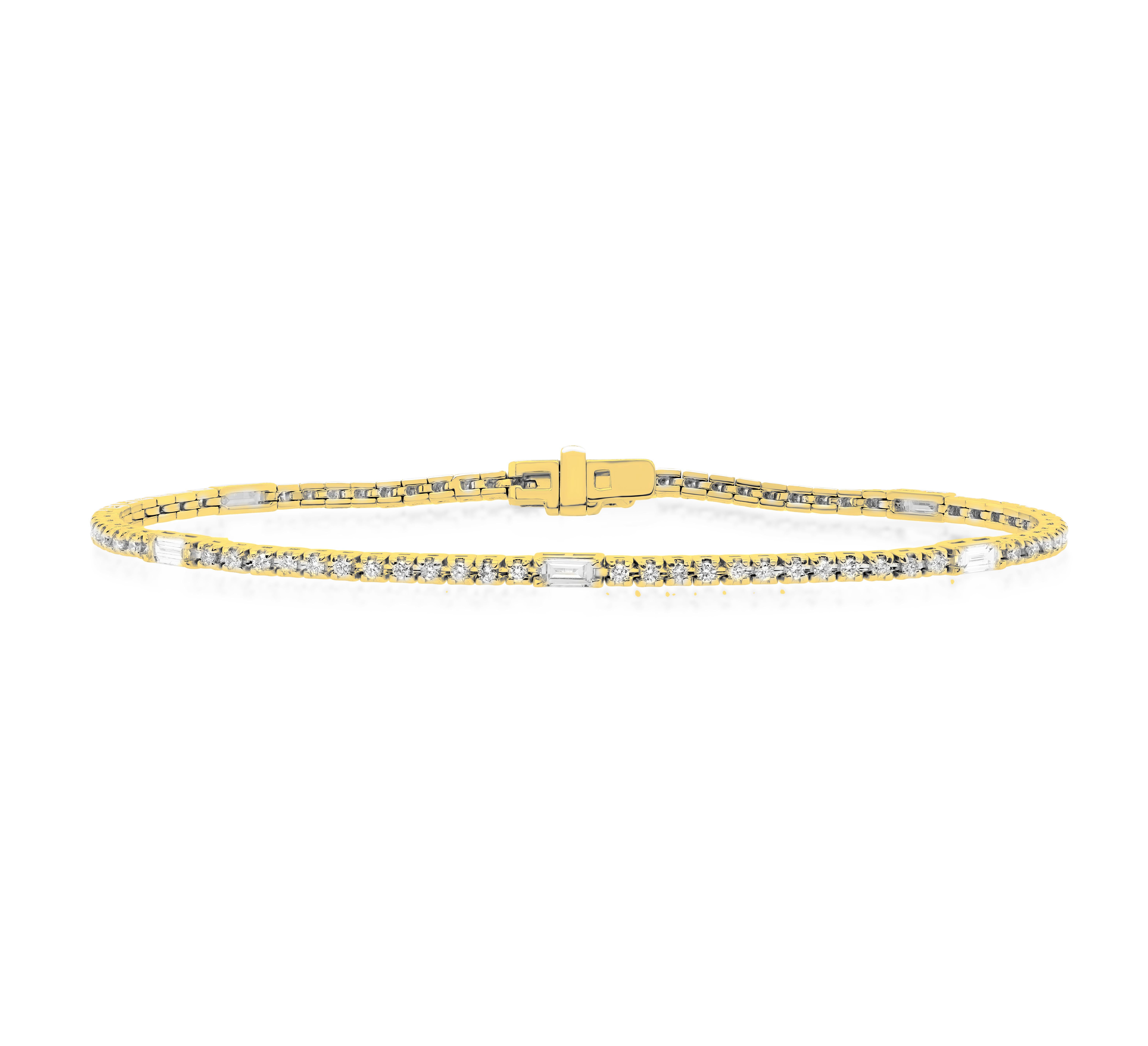 Custom 14kt yellow gold bracelet with 2 cts of rounds and baguette diamonds color FG SI clarity. Excellent Cut.