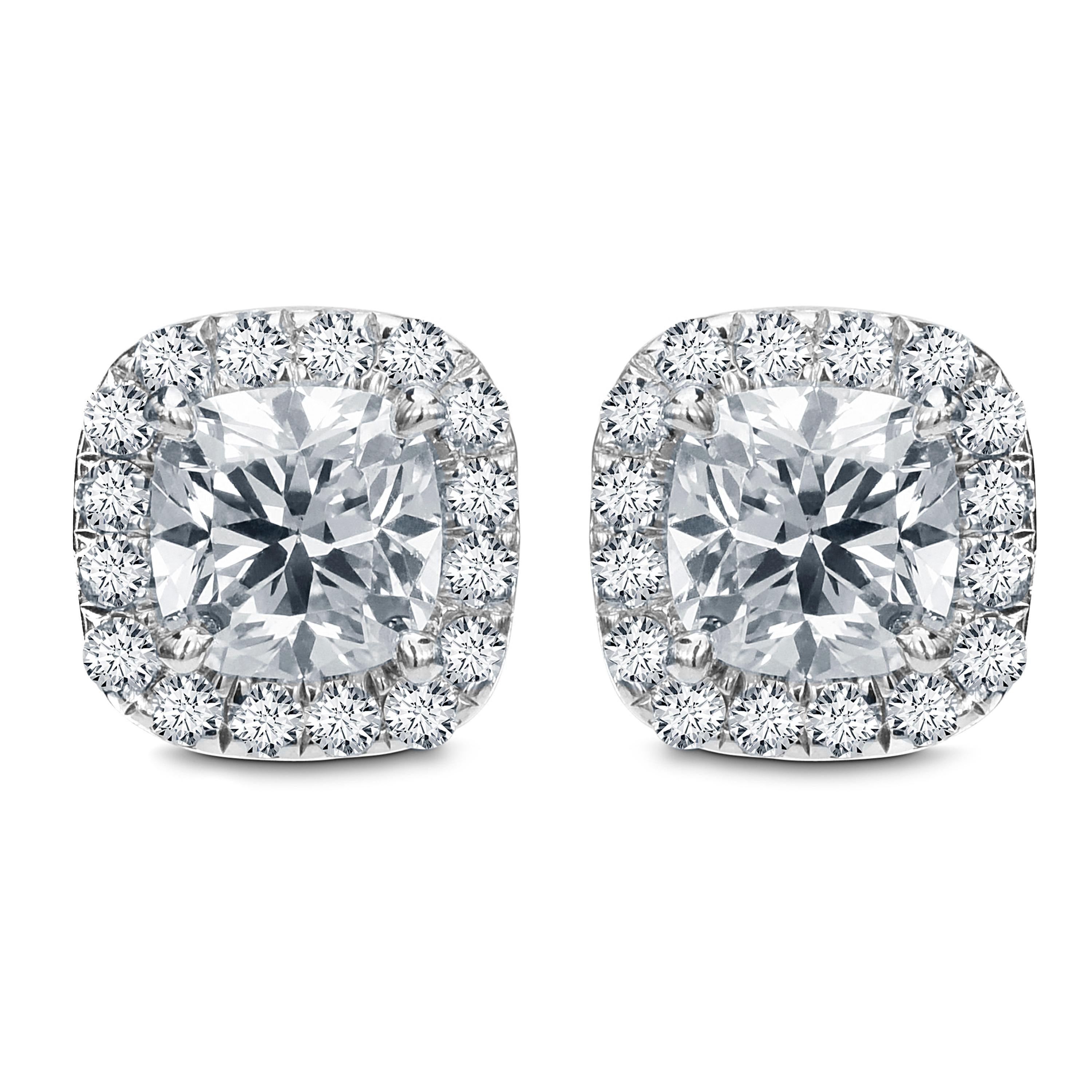 14kt white gold cushion cut diamond halo stud earrings containing 0.34 cts tw of round diamonds set in 0.20 cts halo setting 