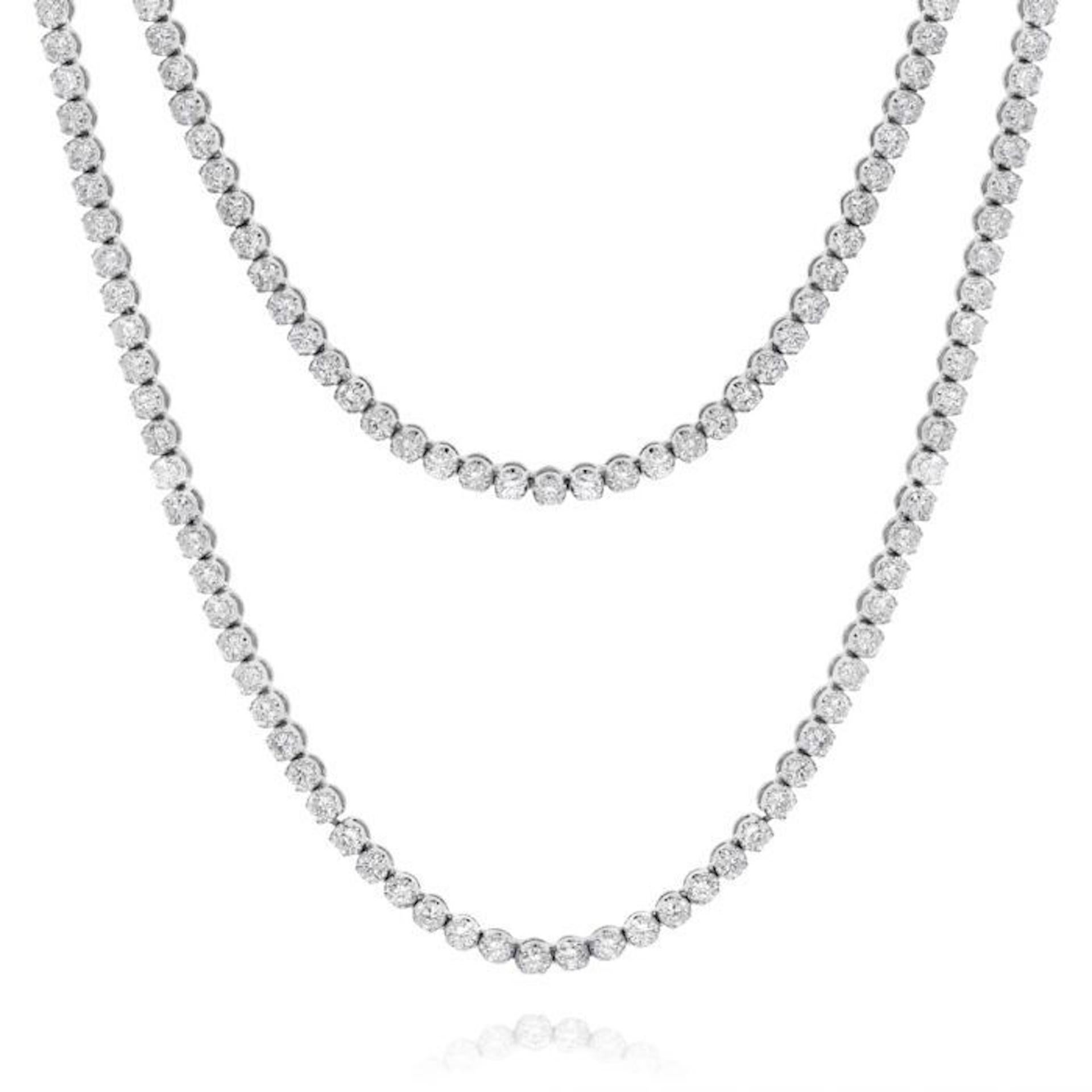 Custom 18k white gold diamond opera tennis necklace
16.80 cts round diamonds 196 stones 0.09 each FG color SI clarity.  Excellent Cut.