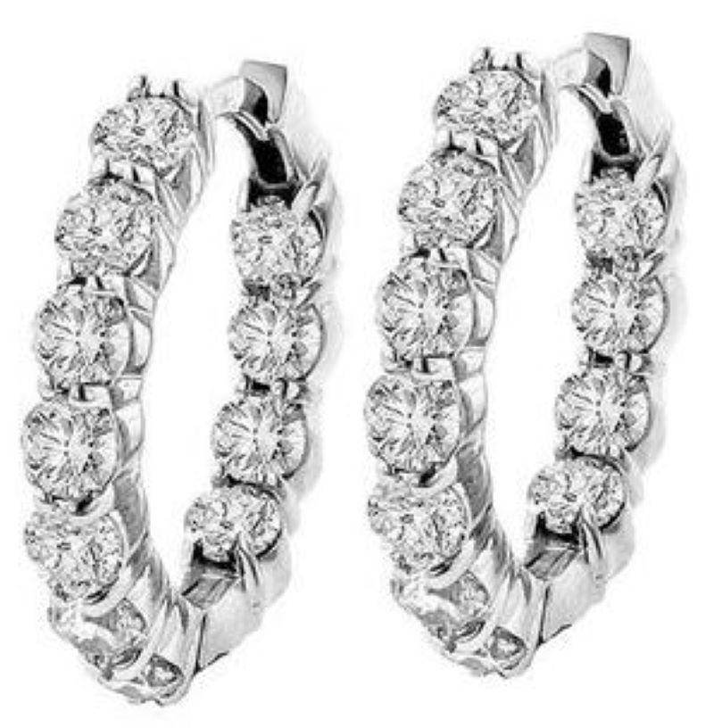 14 kt white gold inside-out curvy hoop earrings adorned with 4.25 cts tw of diamonds