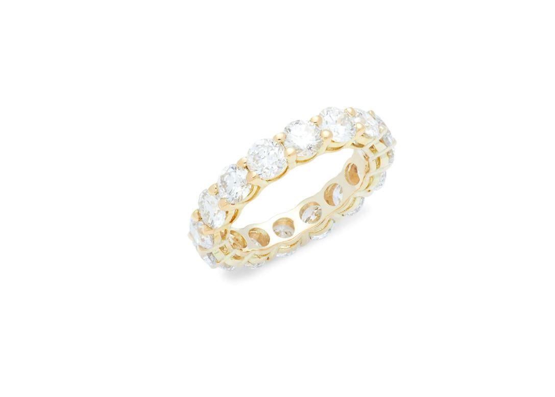 18 kt yellow gold diamond ring with all the way around eternity band design adorned with 5.00 cts tw diamonds