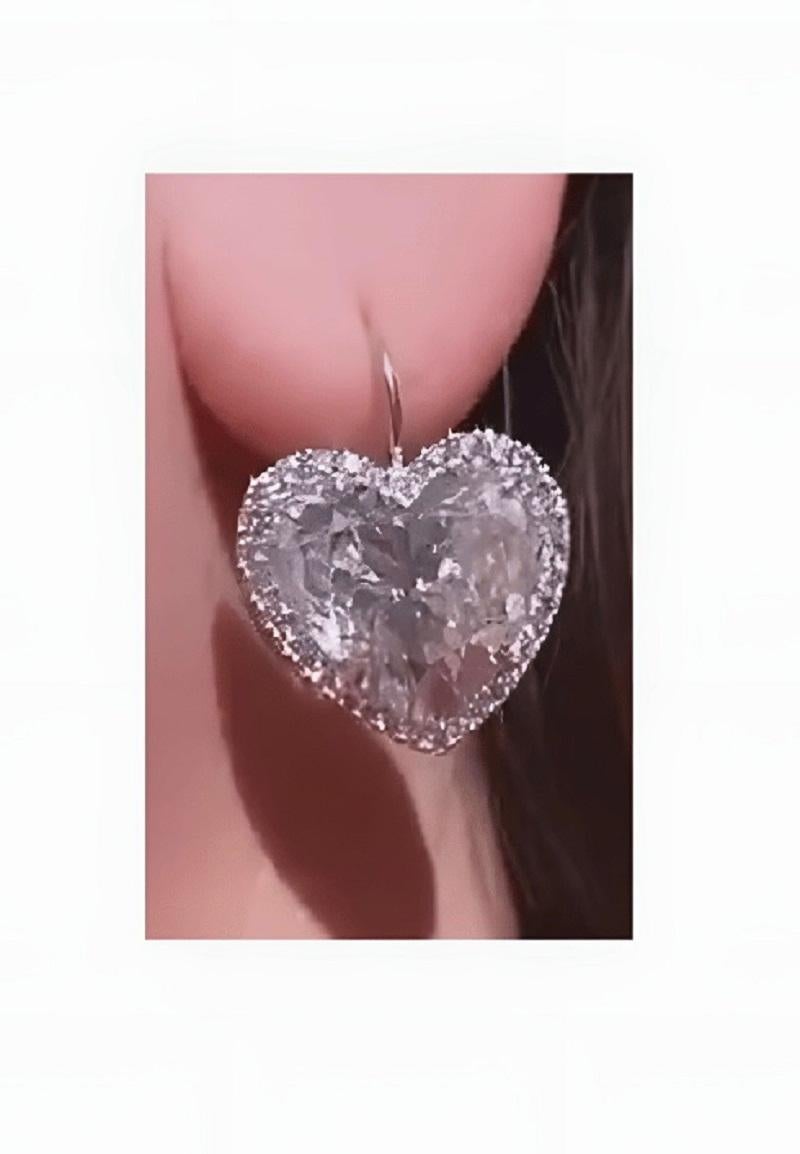 Custom Diamond heart shape earrings 20.51cts total wt GIA certified J-K color VS-SI clarity set with 2cts rounds in 18kt white gold.  Magnificent one of a kind !!! 