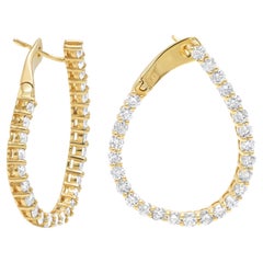 Gold-Ohrringe mit Creolen