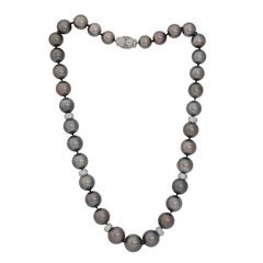Diana M. Diamond pearl necklace adorned with 11-14 mm Tahitian south sea pearls