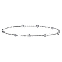 Diana M. Diamonds by the yard bracelet totaling 0.50 carats set in 14 kt WG