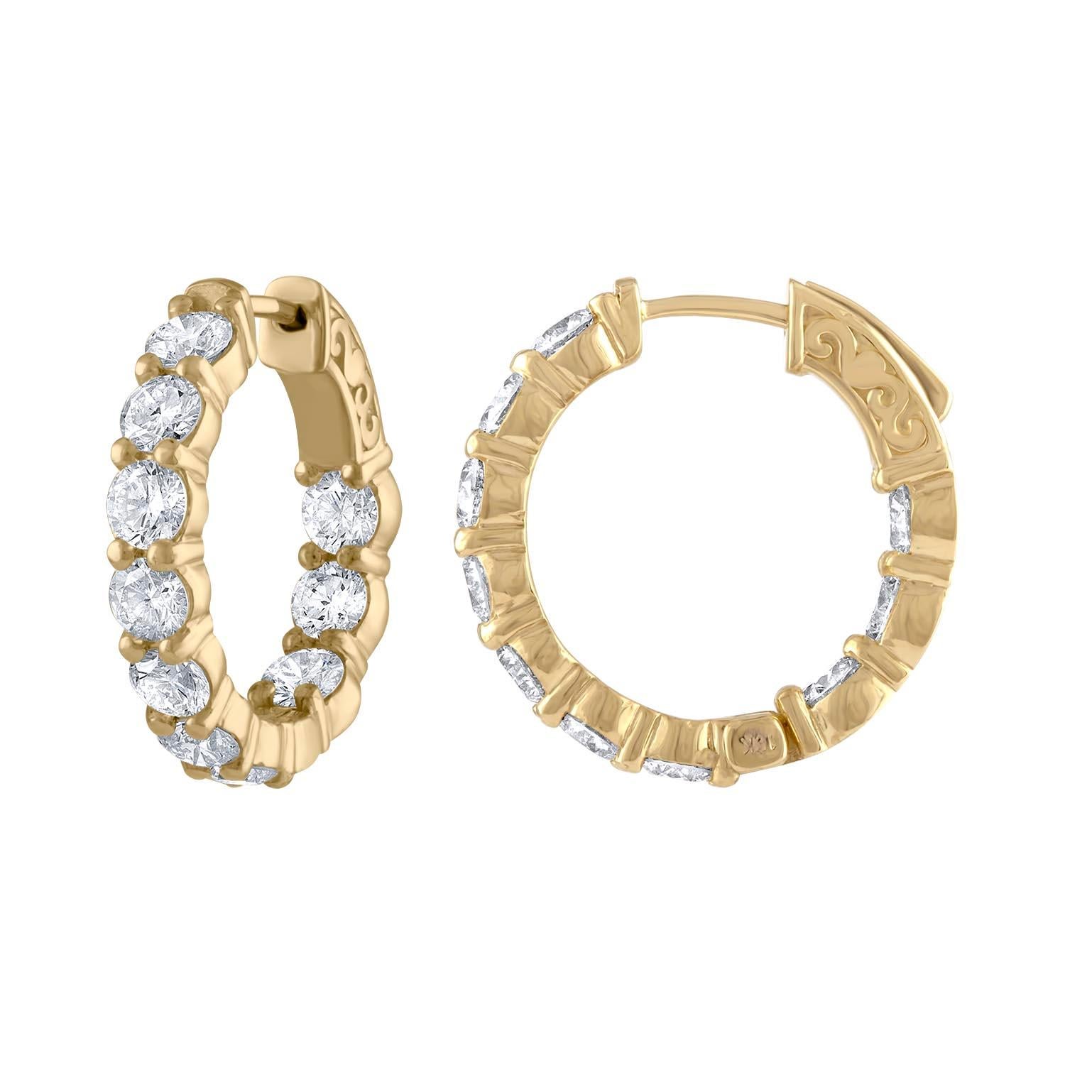 18 karat yellow gold diamond hoop earrings feature 4.10 cts round cut diamonds. 
