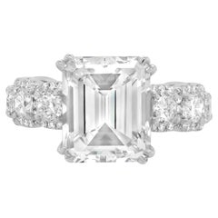 Diana M. GIA 5.04ct Emerald Cut Engagment Ring With 3.00ct Of Side Diamonds