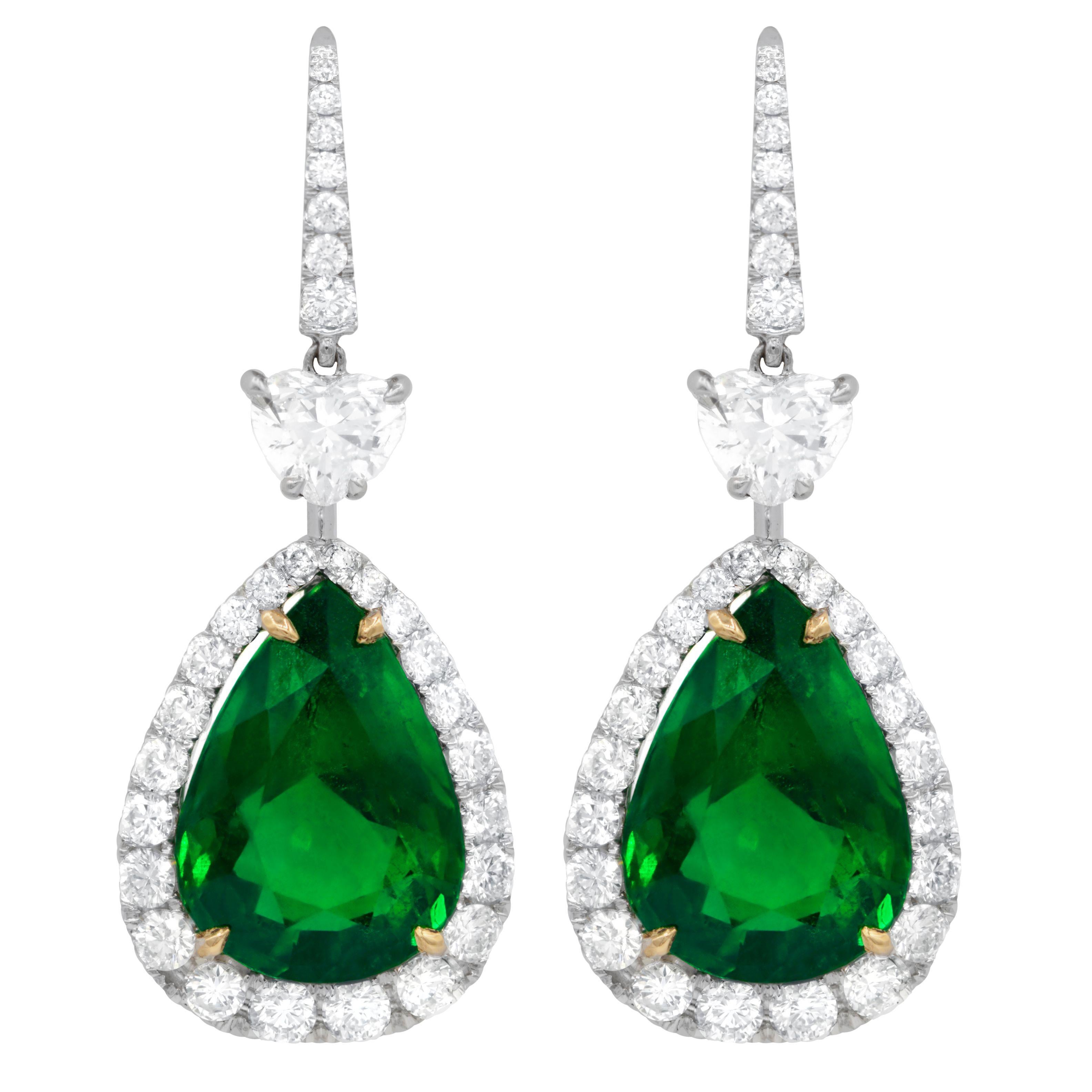 Beautiful pair of Pear Shaped Green Emerald Drop Earrings, with 15.34 Carats of total Gemstone Weight and Two GIA Certified Hear Shaped Diamonds in 1.41 Carats of Diamond Weight accompanied by Round diamonds of different weight in Total of 2.35