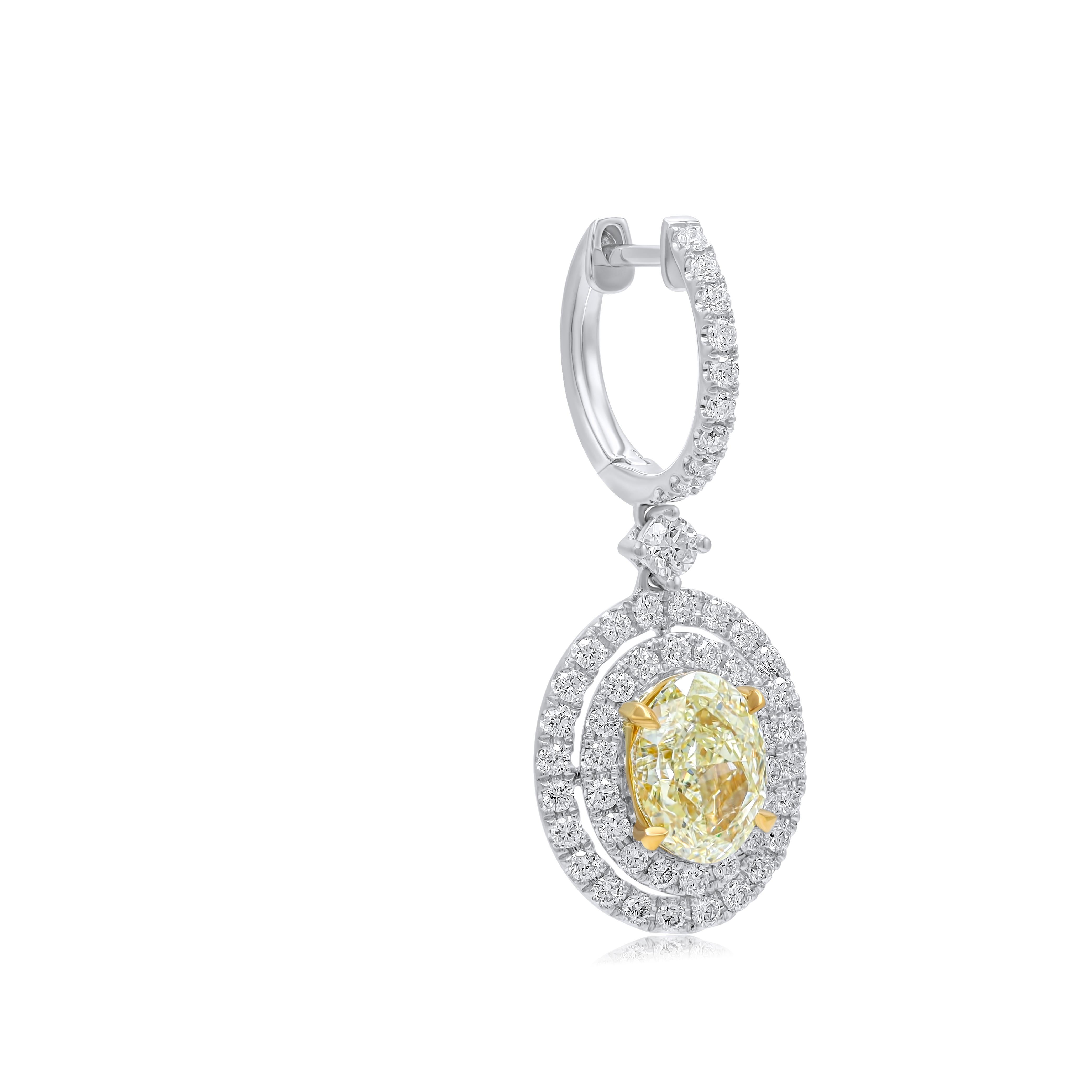 Modern Diana M. GIA  Fancy Light Yellow Oval Diamond Earrings 3.00cts With Dauble Halo For Sale