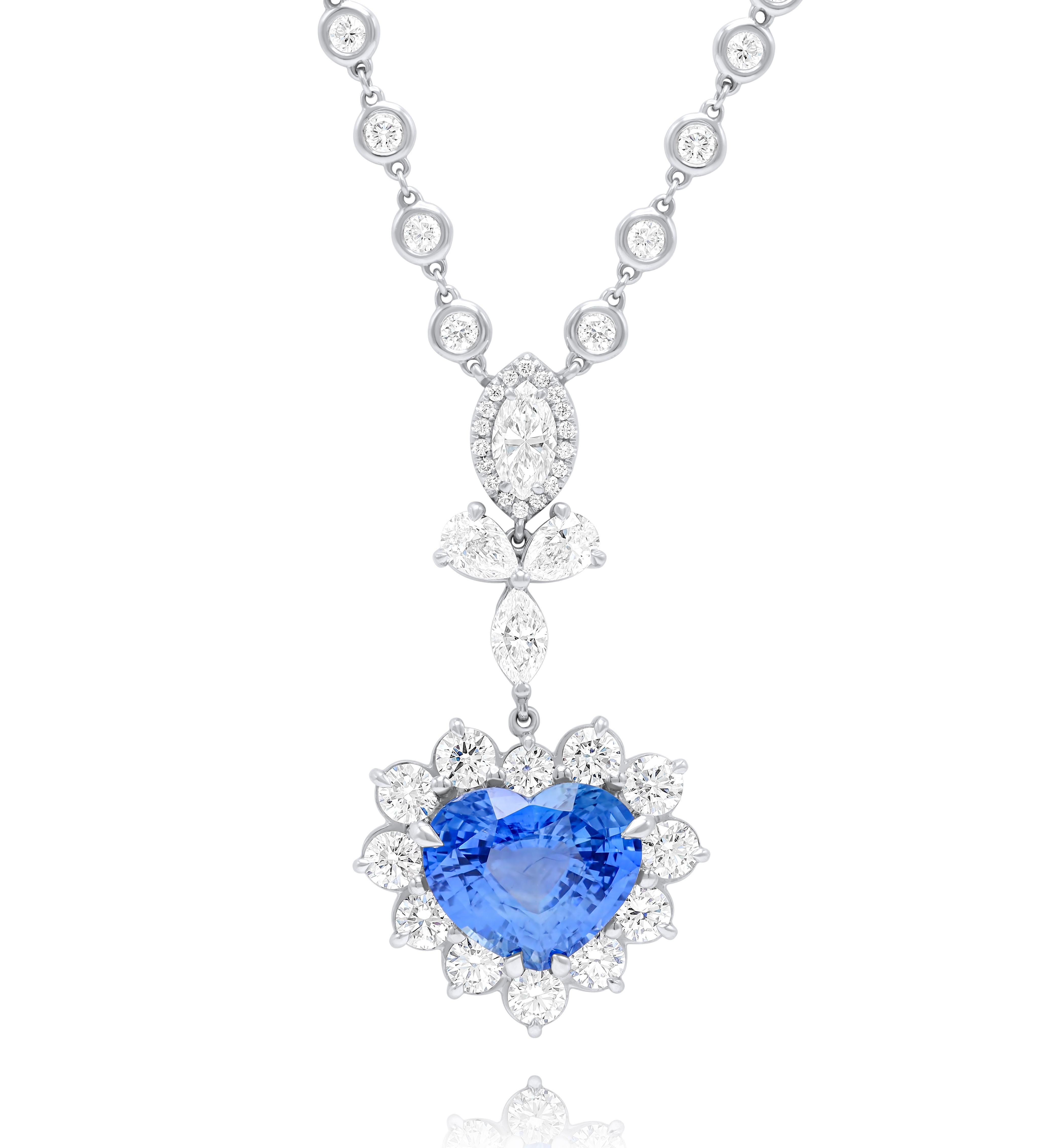 18kt Ceylon sapphire heart shape pendent with 8.18ct heart shape GRS certified and adorned with 8.35cts of white diamonds all set in white gold.