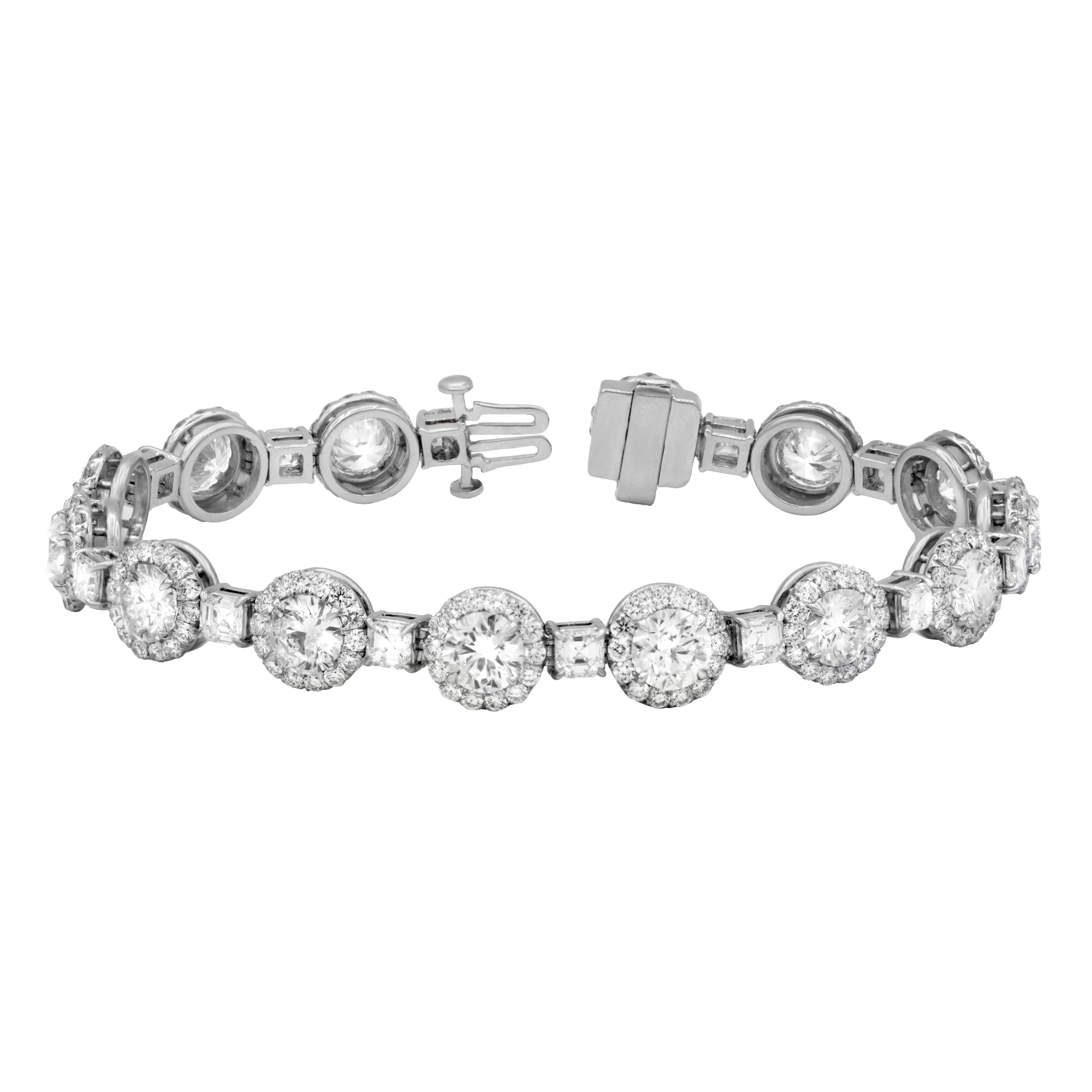 Magnificent platinum diamond tennis bracelet adorned with large round diamonds surrounded by micropave round diamonds and separated by asscher cut diamonds totaling 17.40 cts
Diana M. is a leading supplier of top-quality fine jewelry for over 35