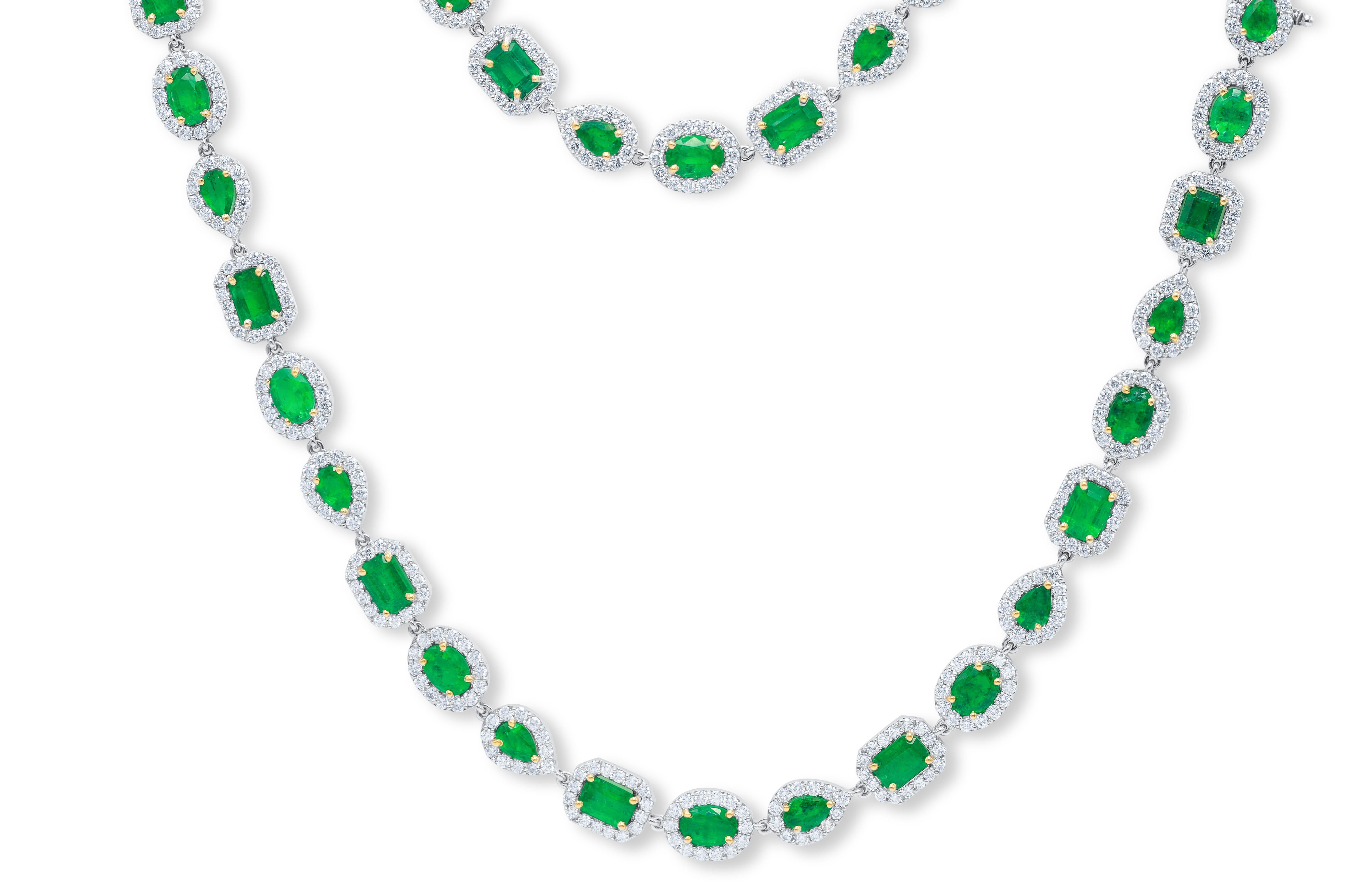 18kt white gold long necklace emerald total 46.10 cts (mixed shape, marquises, asscher, oval & rd) with halo rd total 46.10 cts diamonds, sizes 20