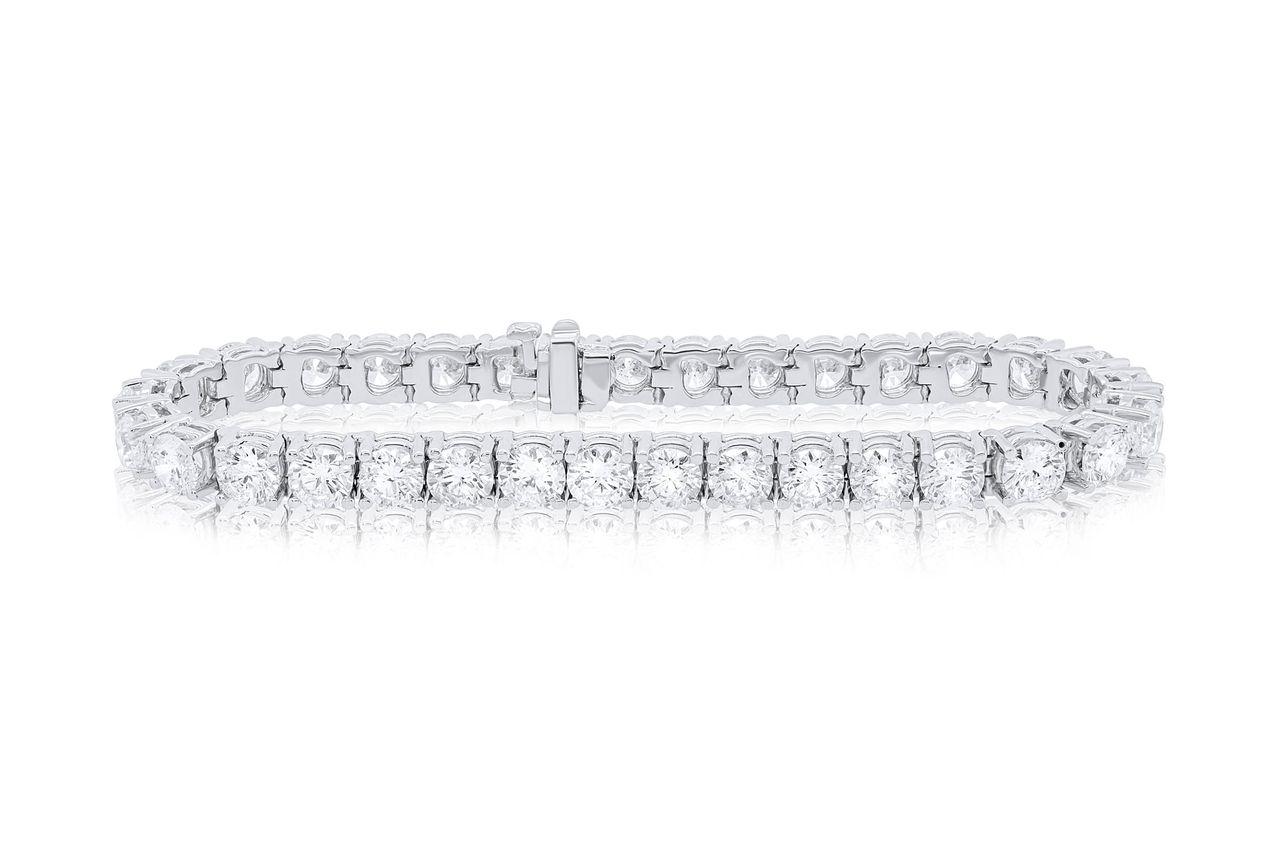 Pulsera de tenis de platino con 4 puntas adornada con 17,00 cts tw de diamantes redondos (33 piedras)