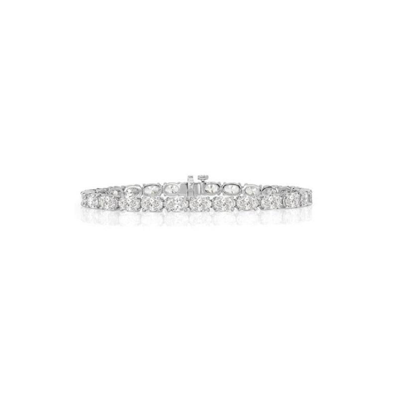 Modern Diana M. Platinum 4 prong diamond tennis bracelet 14.31ct of ovals  For Sale